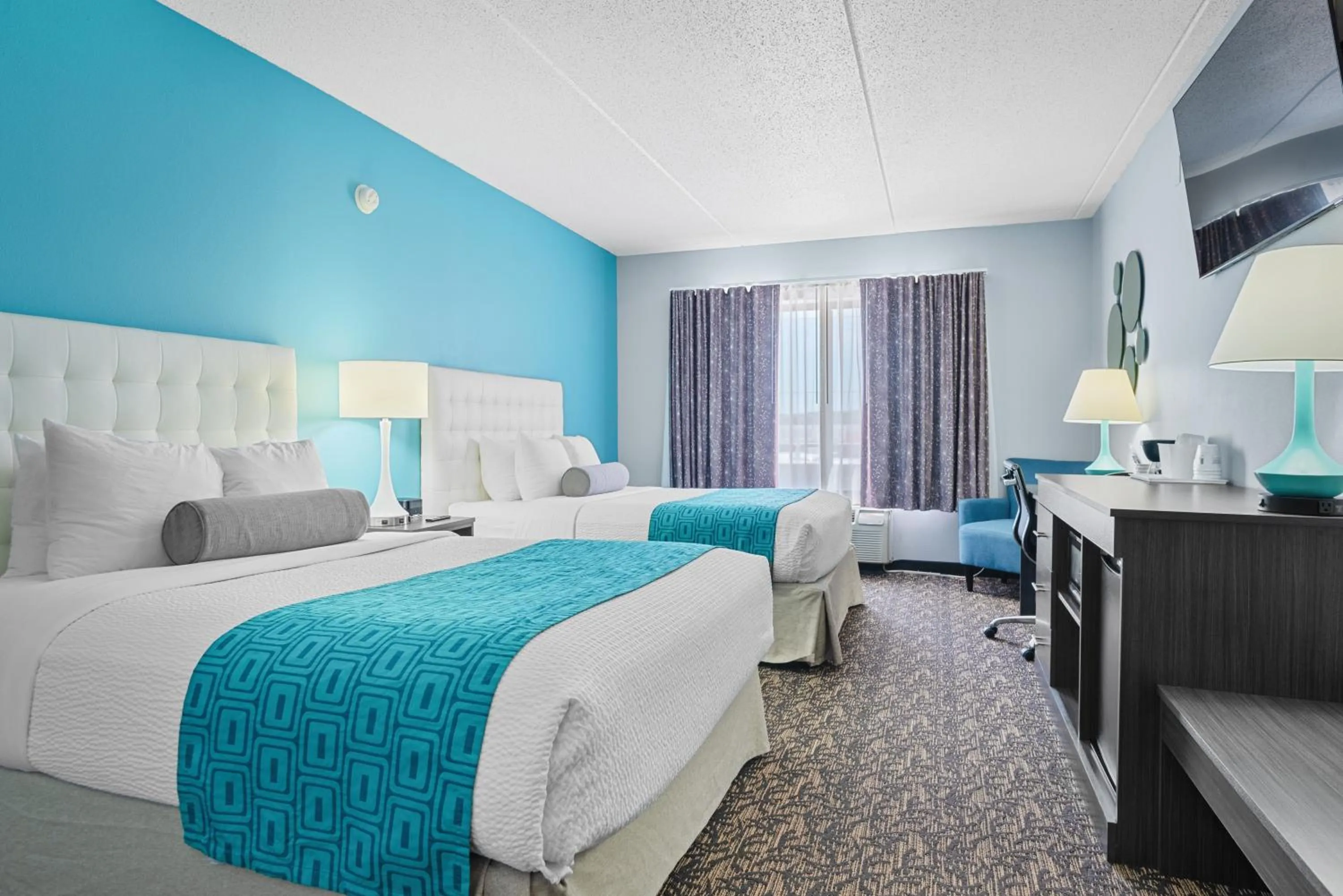 Bed in Elevation Inn & Suites, Trademark Collection by Wyndham