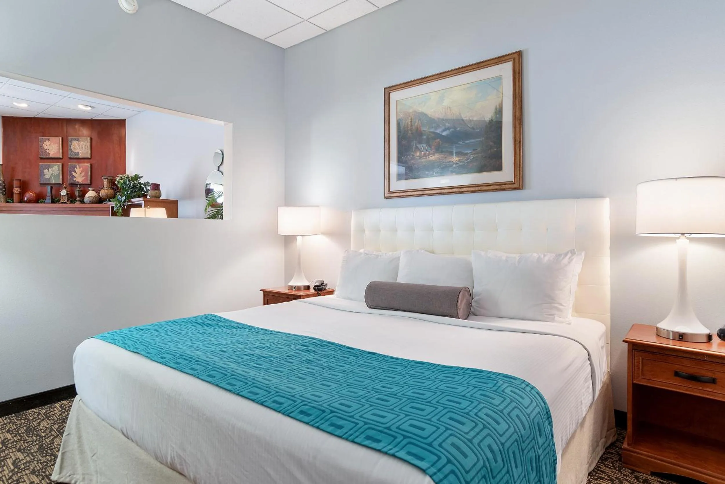 Bed in Elevation Inn & Suites, Trademark Collection by Wyndham