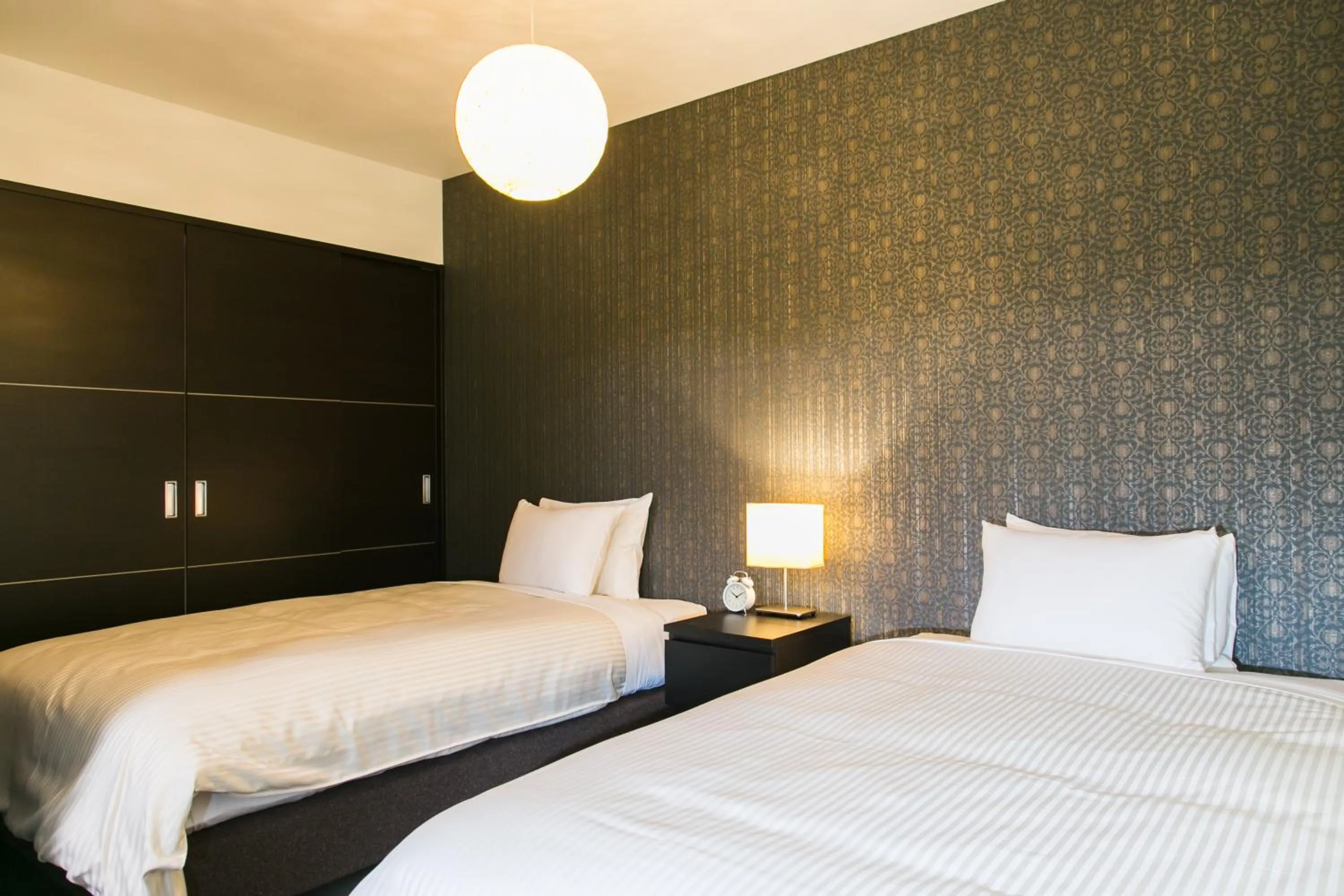 Bed in Kyoto Four Sisters Residence