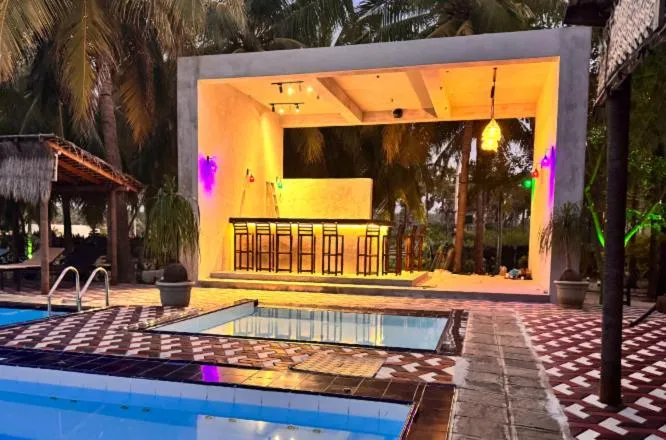 Swimming pool in De Silva Palm Resort
