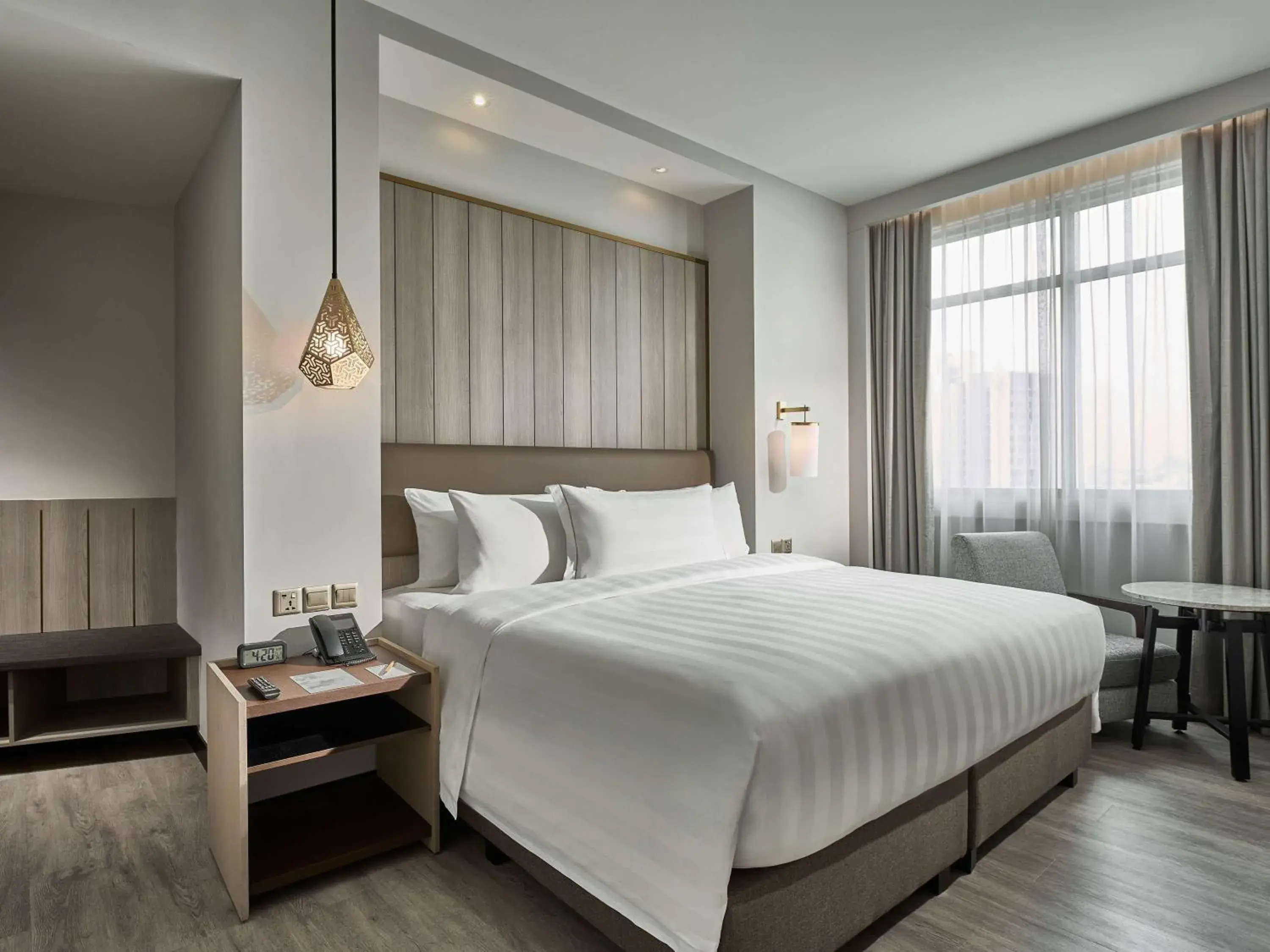 Family Quadruple Room, 1 King Bed and 2 Single Beds in Novotel Singapore on Kitchener Family Quadruple Room, 1 King Bed and 2 Single Beds in Novotel Singapore on Kitchener