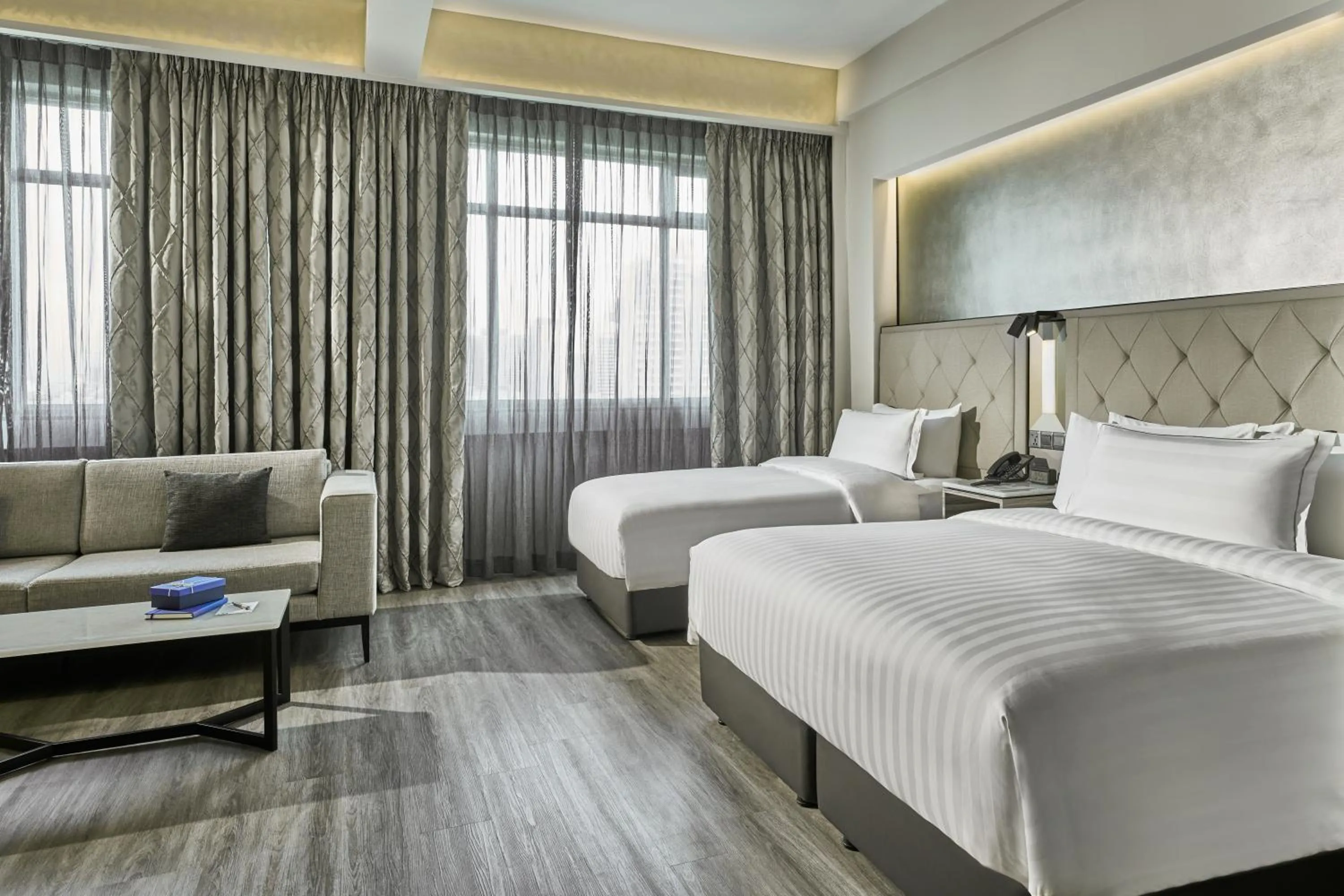 Seating area, Bed in Novotel Singapore on Kitchener