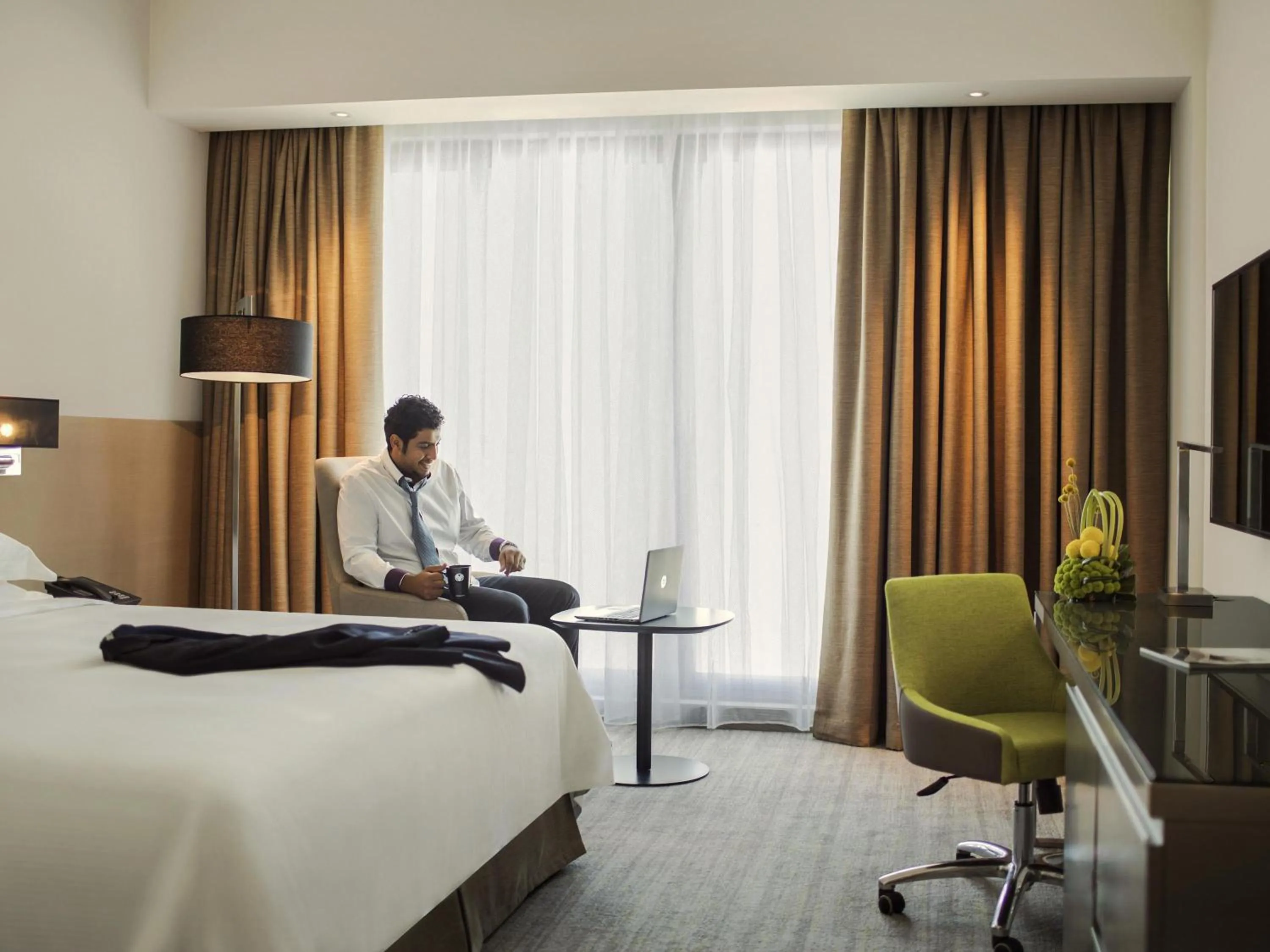 Bedroom in Novotel Muscat Airport