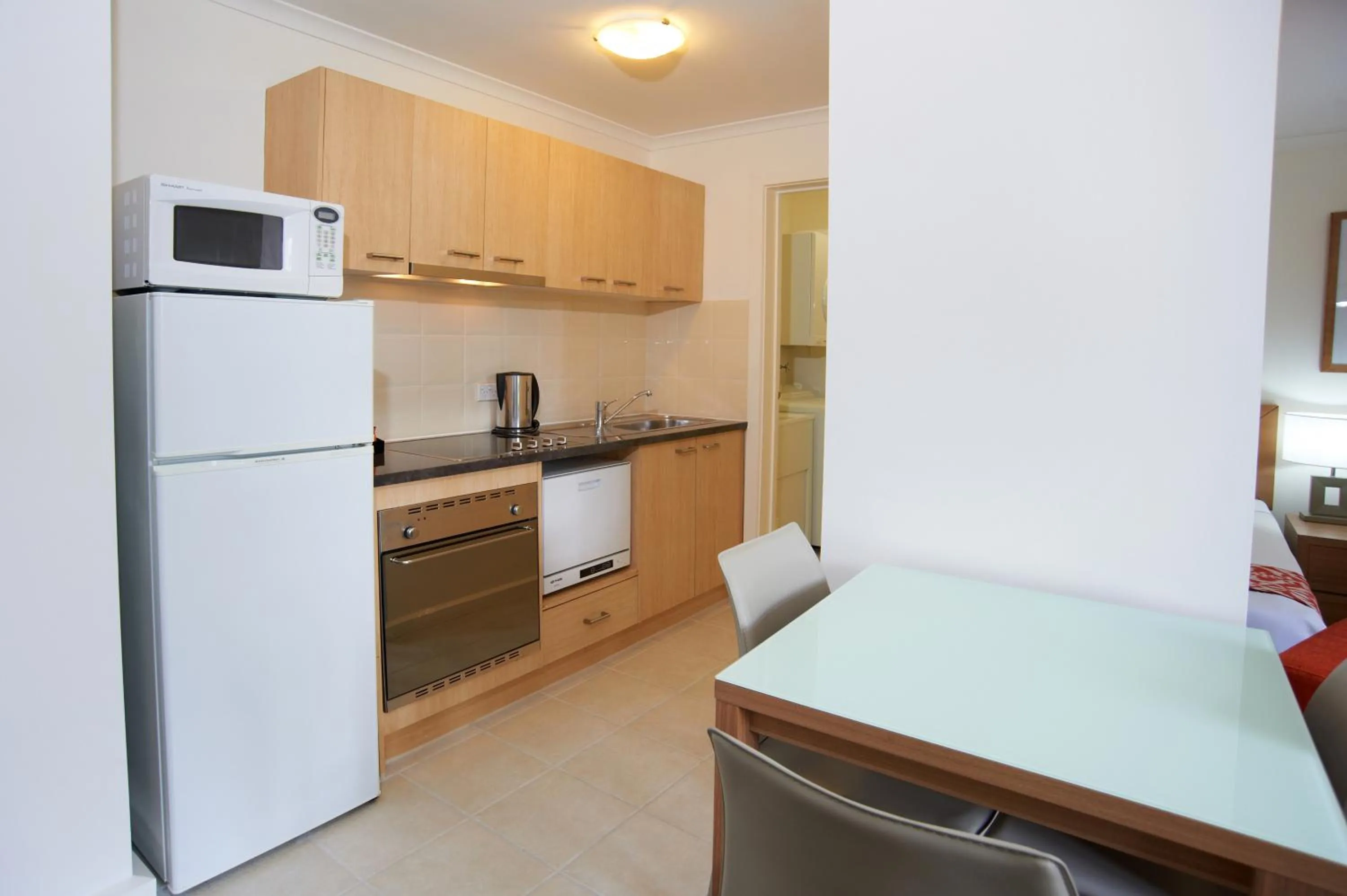 Kitchen or kitchenette in Quest St Kilda Bayside