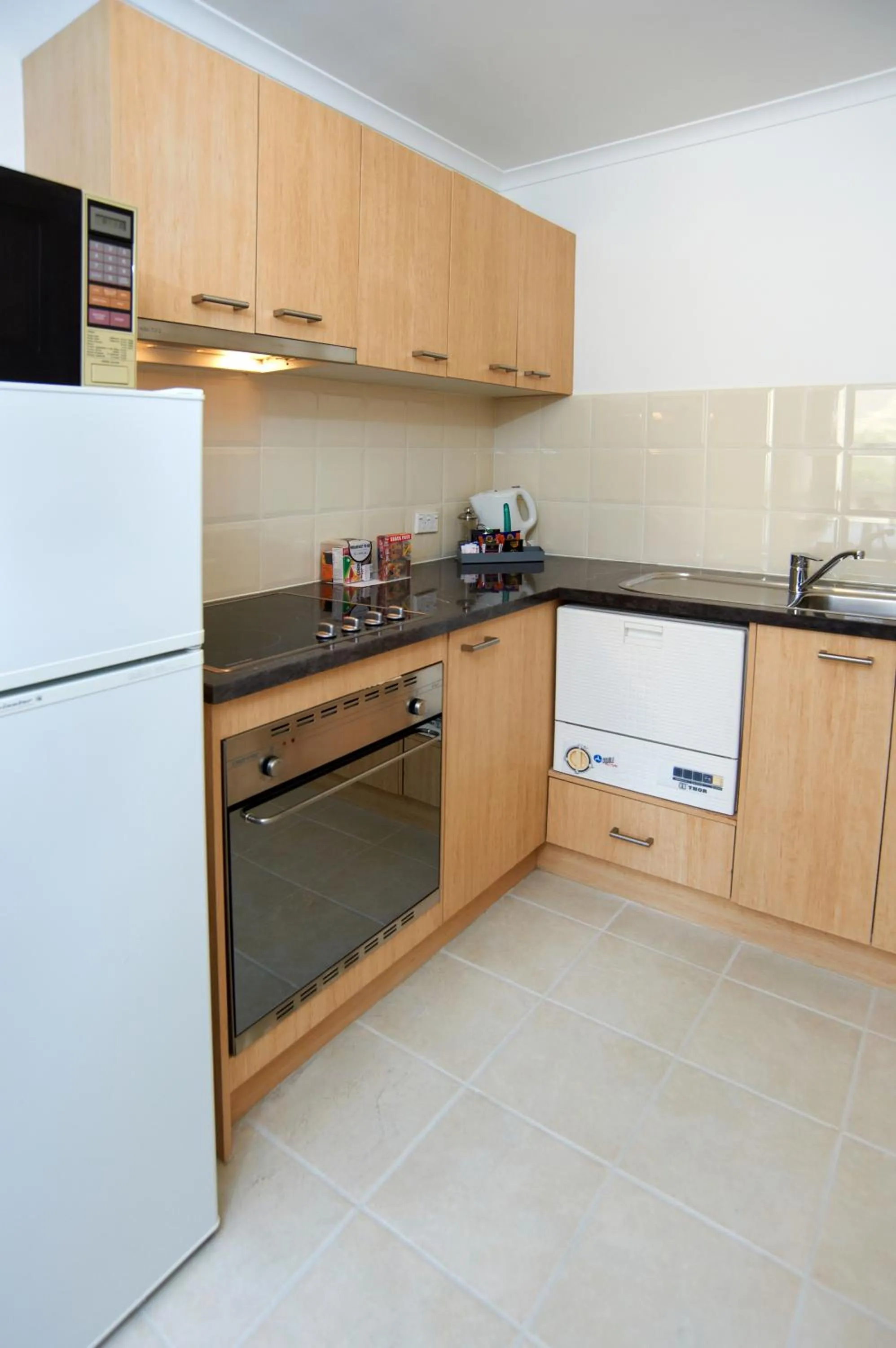 Kitchen or kitchenette in Quest St Kilda Bayside