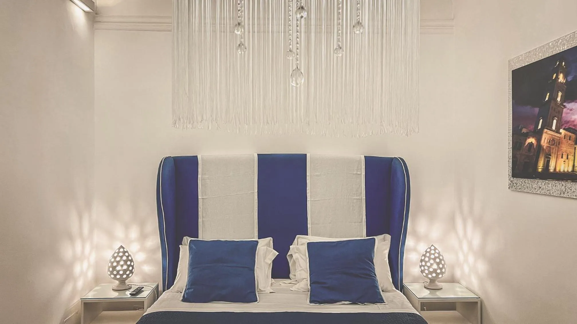 Bed in Cadelli Luxury Suite & Apartments