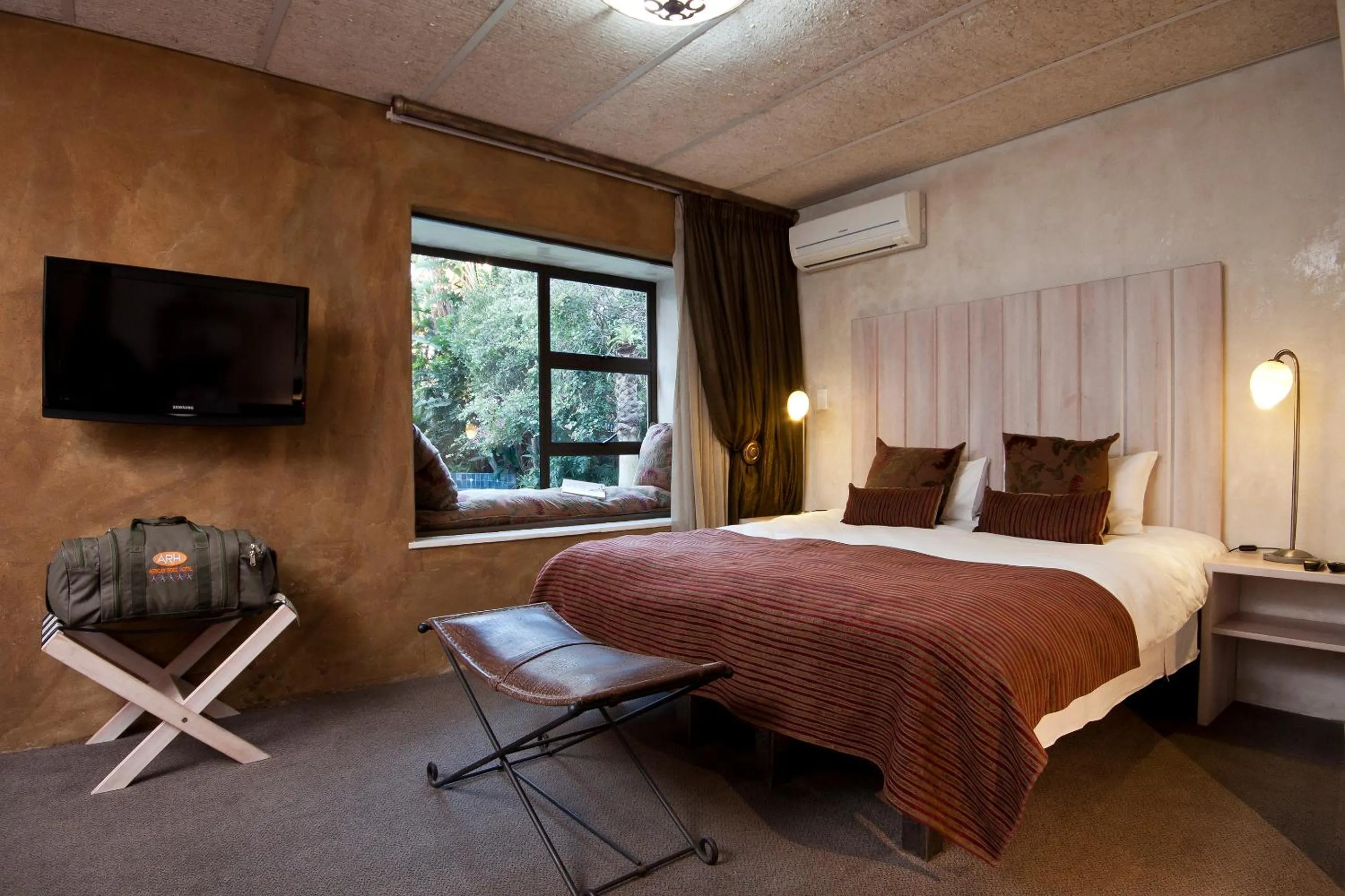 Bed in African Rock Hotel & Spa, a "Boutique Lifestyle Resort"