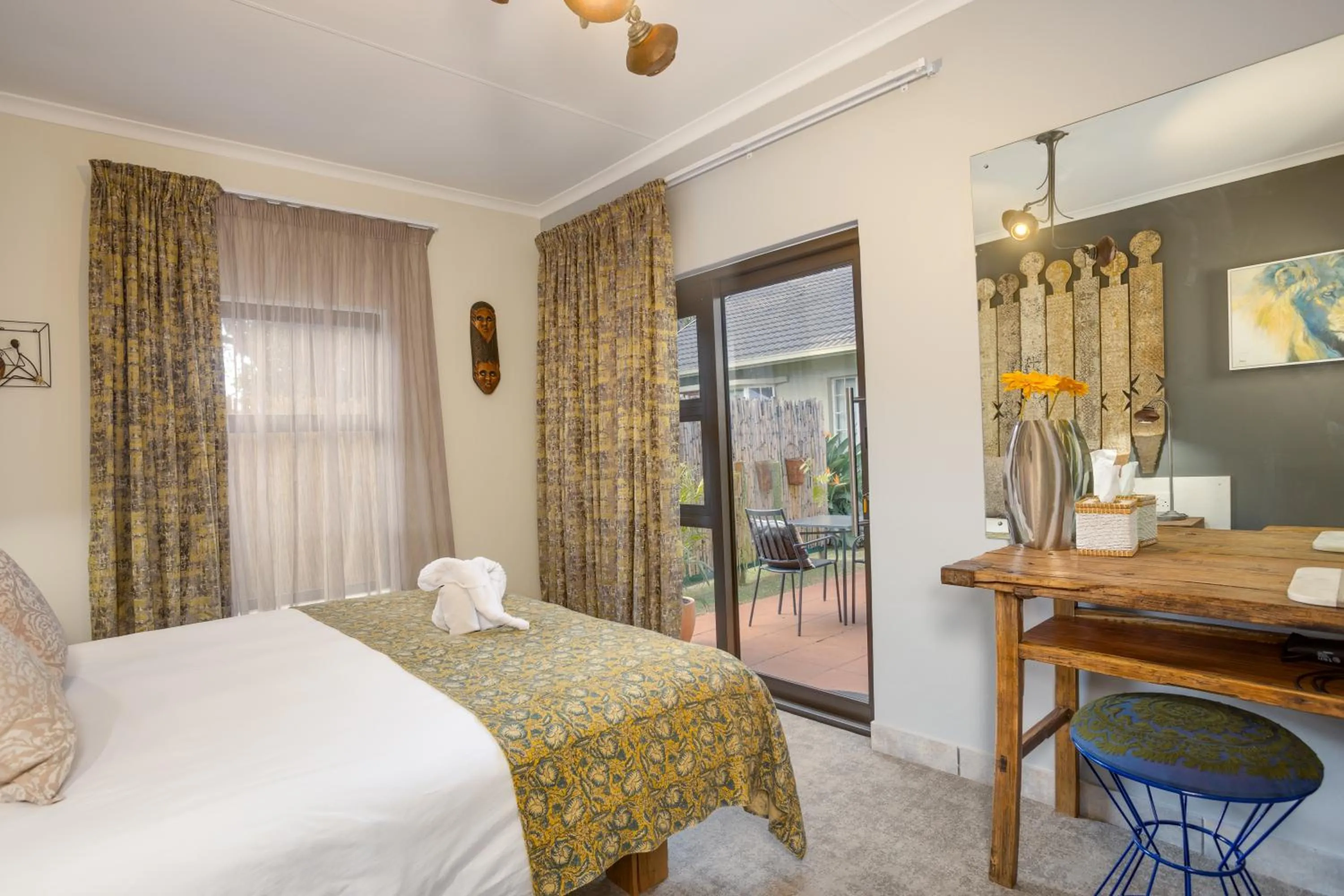 Bed in African Rock Hotel & Spa, a "Boutique Lifestyle Resort"