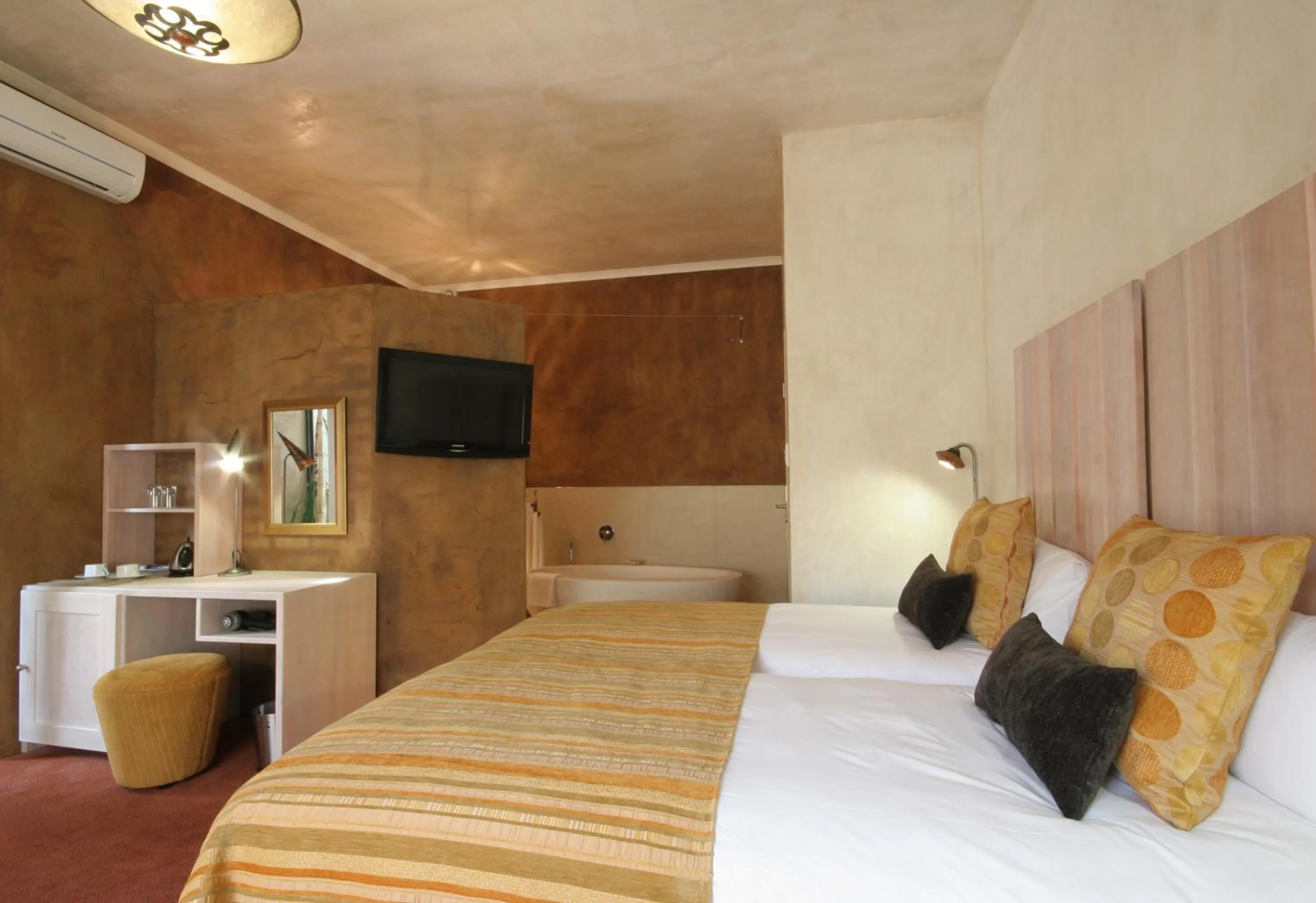 Photo of the whole room, Bed in African Rock Hotel & Spa, a "Boutique Lifestyle Resort"