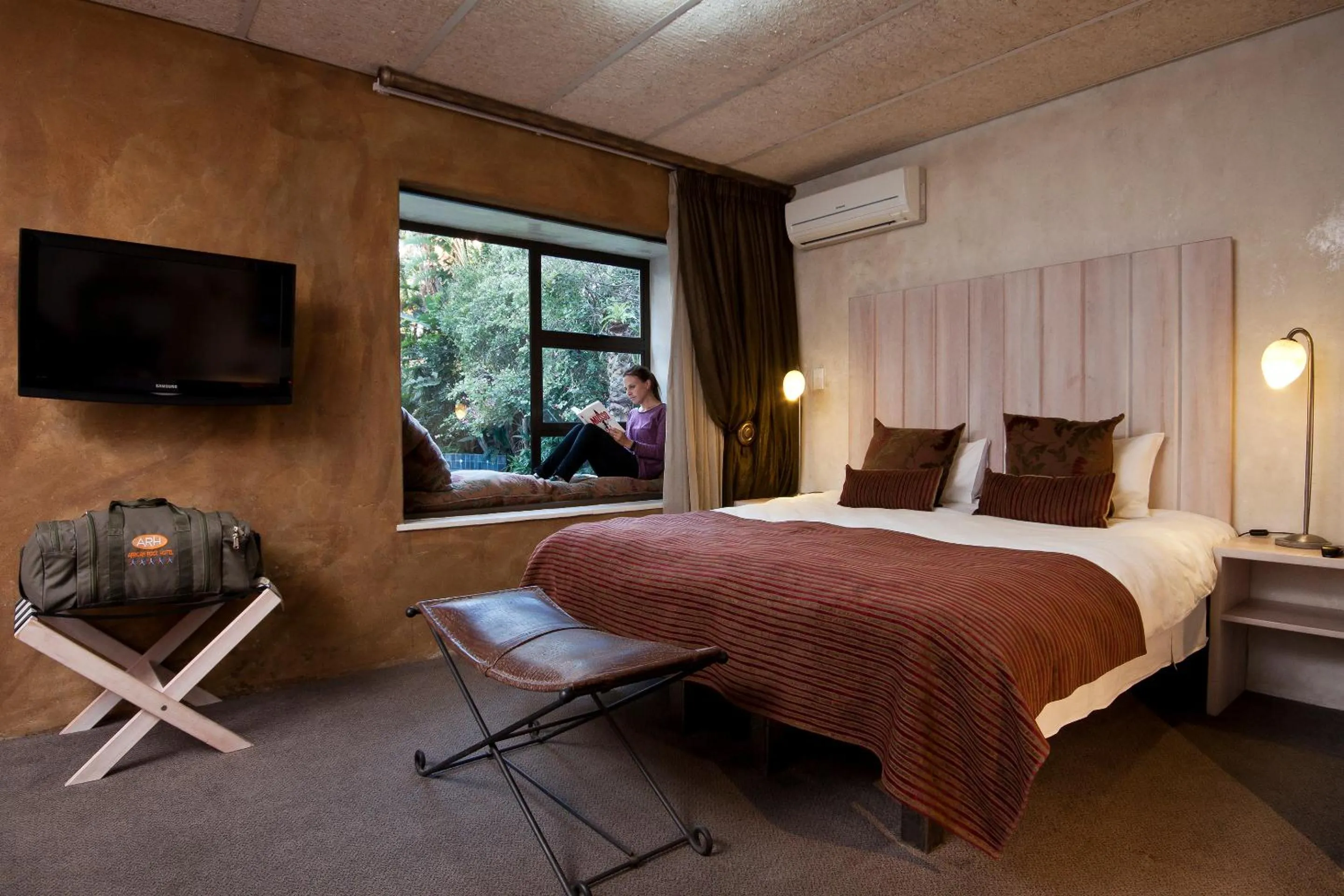 Bed in African Rock Hotel & Spa, a "Boutique Lifestyle Resort"