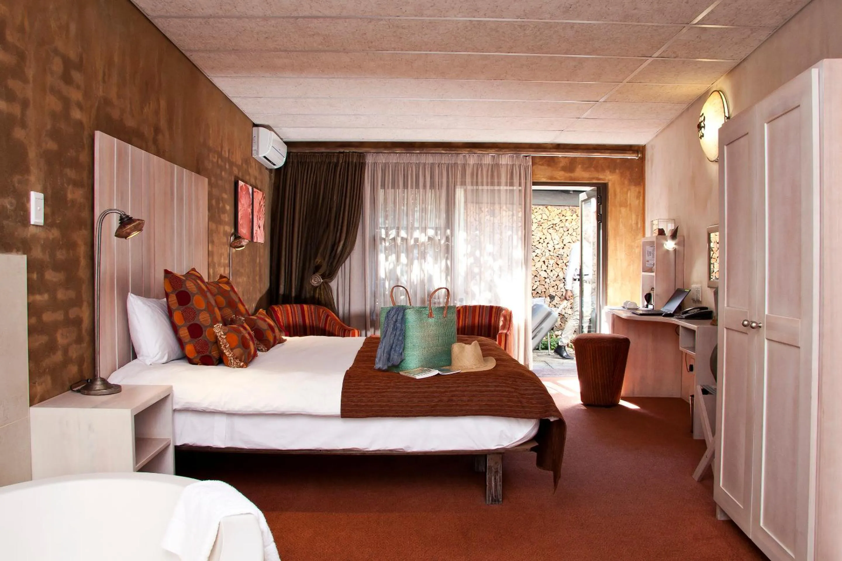 Bed in African Rock Hotel & Spa, a "Boutique Lifestyle Resort"