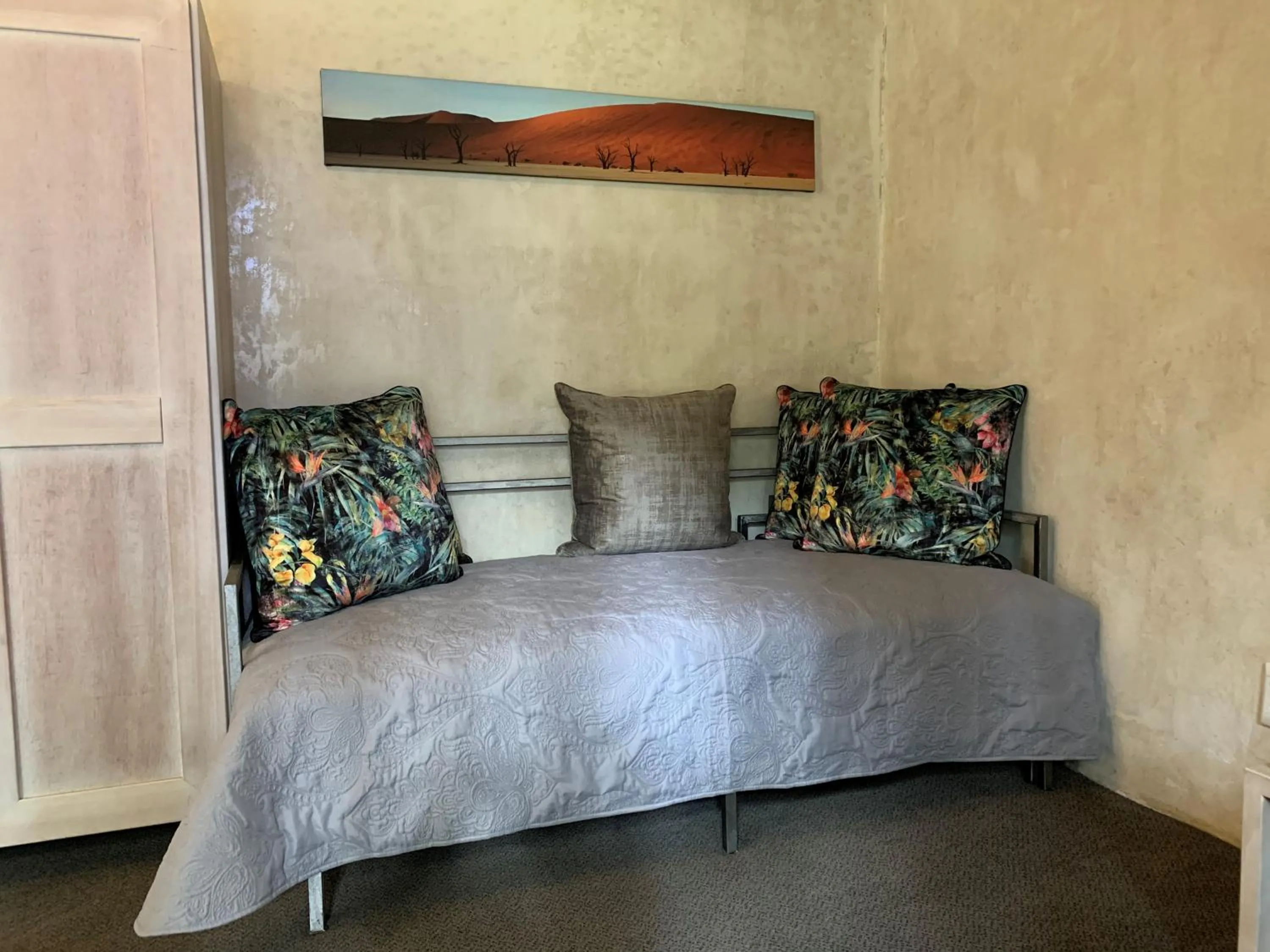 Seating area, Bed in African Rock Hotel & Spa, a "Boutique Lifestyle Resort"