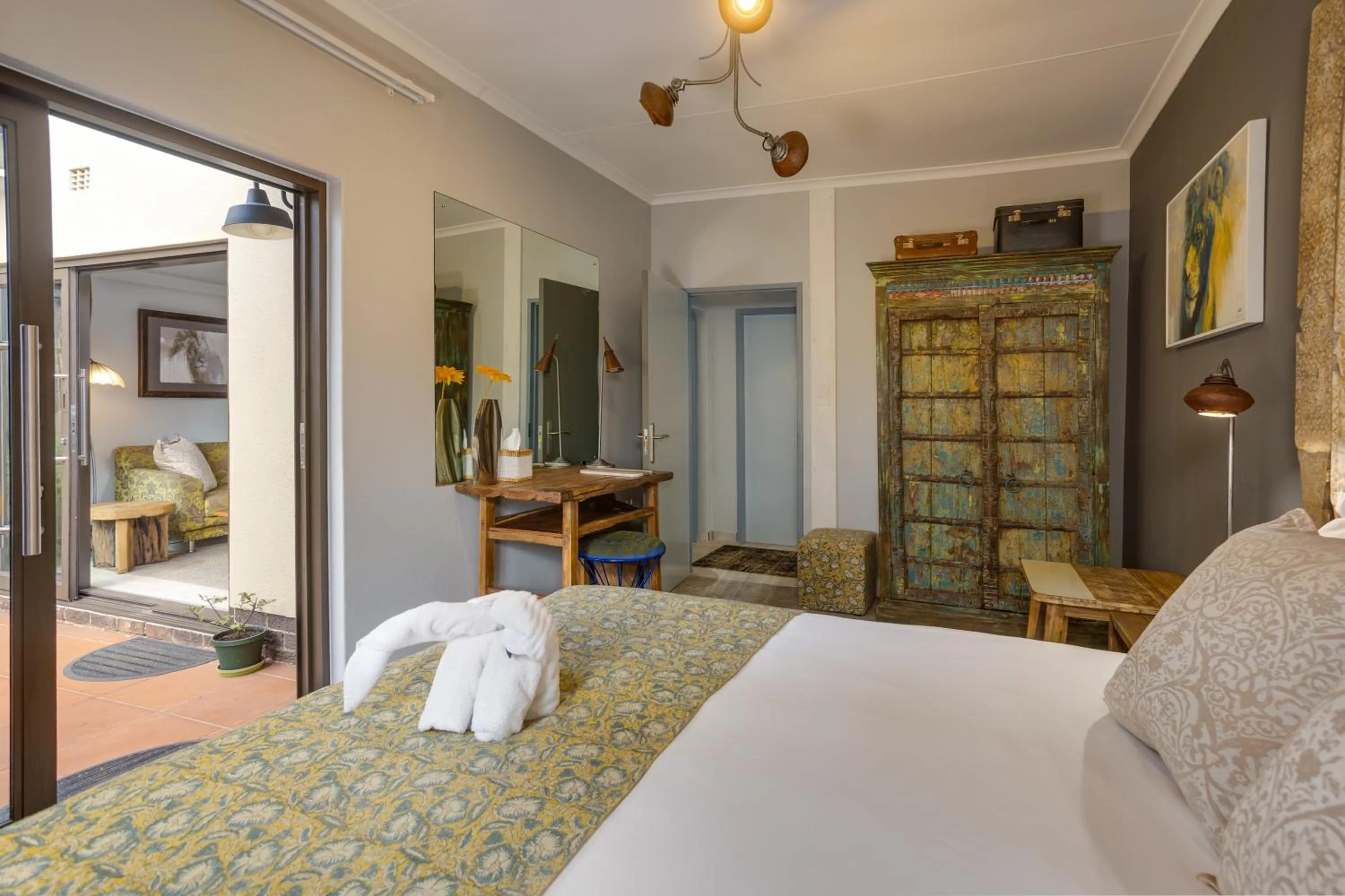 Seating area, Bed in African Rock Hotel & Spa, a "Boutique Lifestyle Resort"