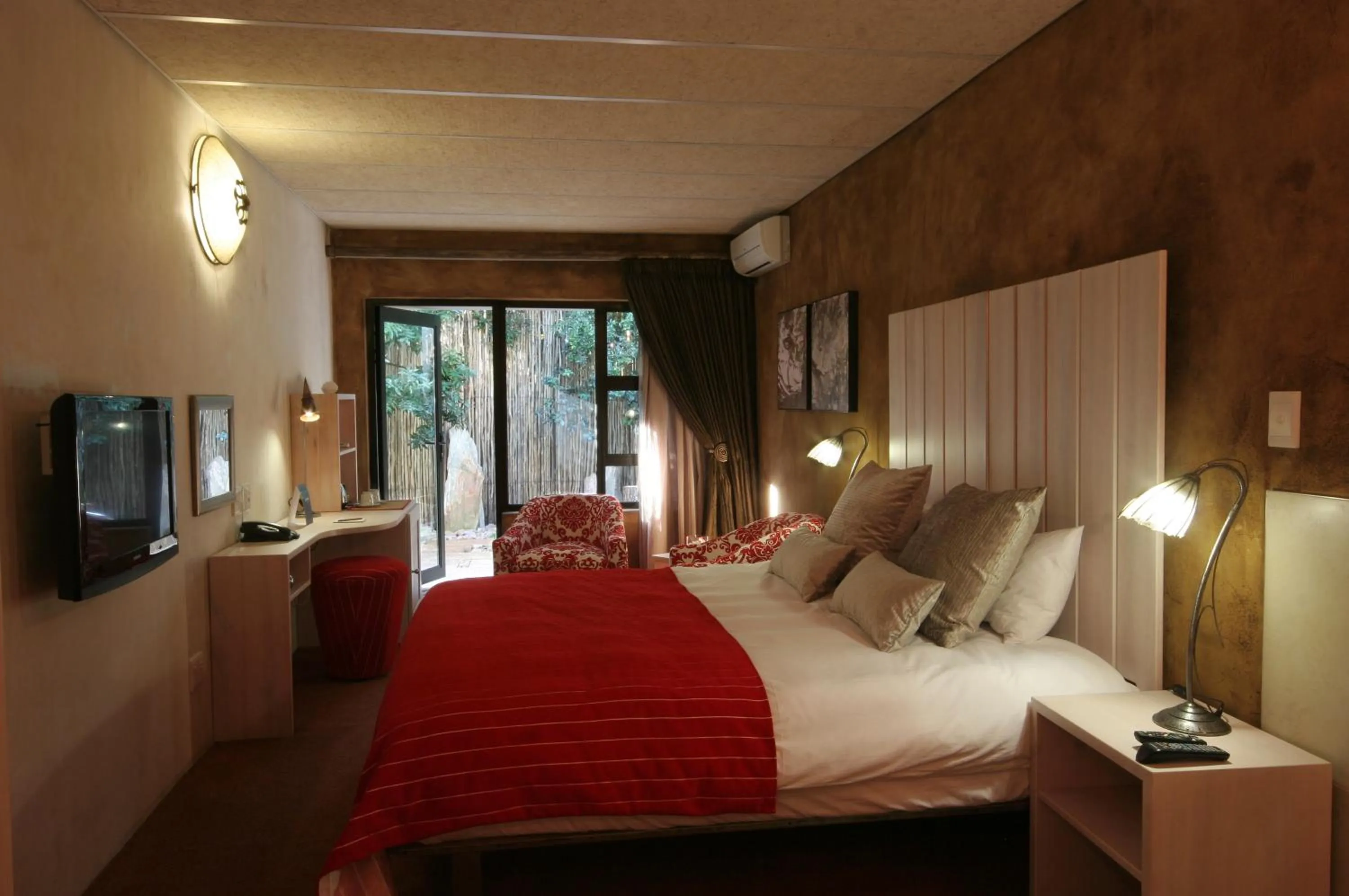 Photo of the whole room, Bed in African Rock Hotel & Spa, a "Boutique Lifestyle Resort"
