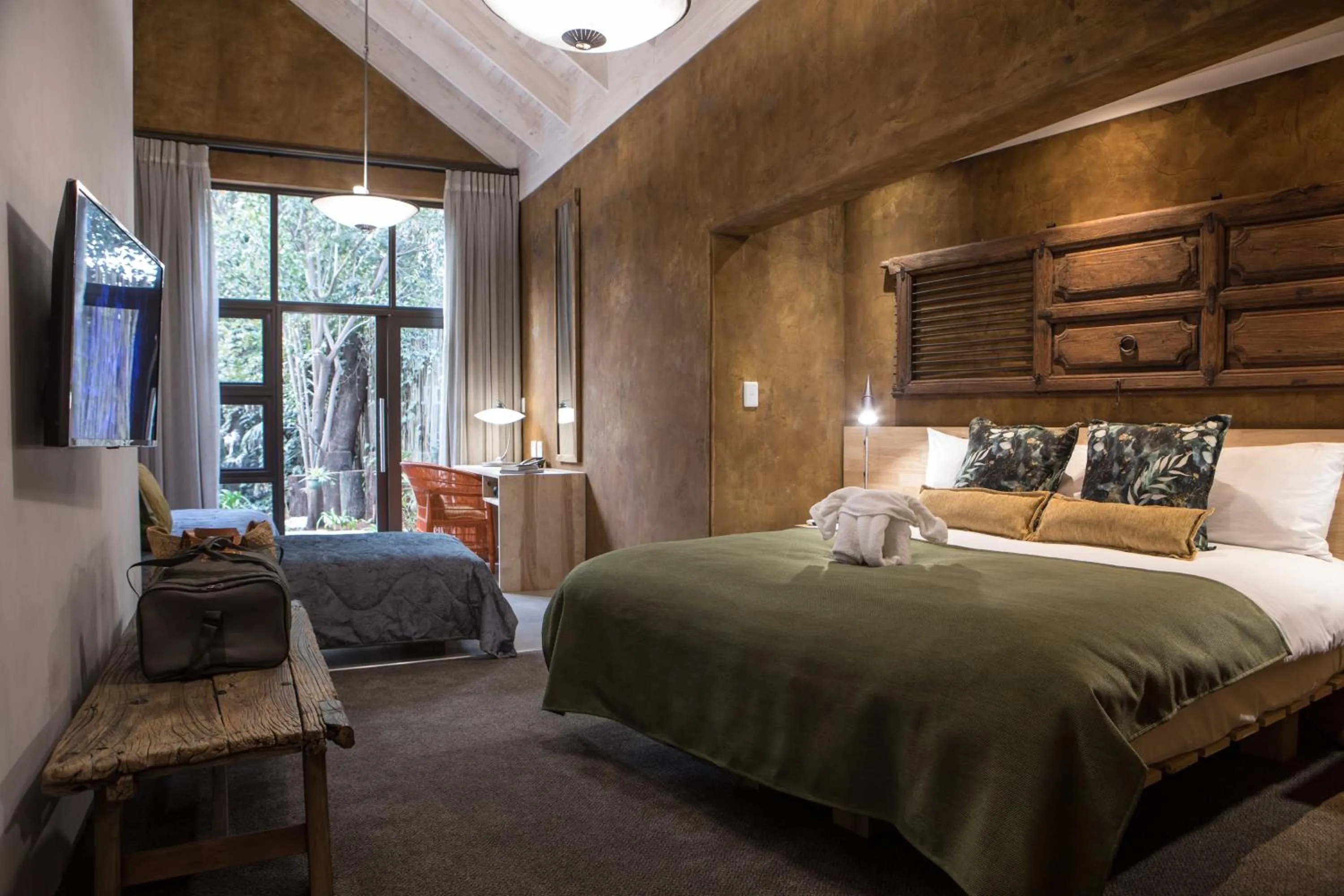 Bed in African Rock Hotel & Spa, a "Boutique Lifestyle Resort"