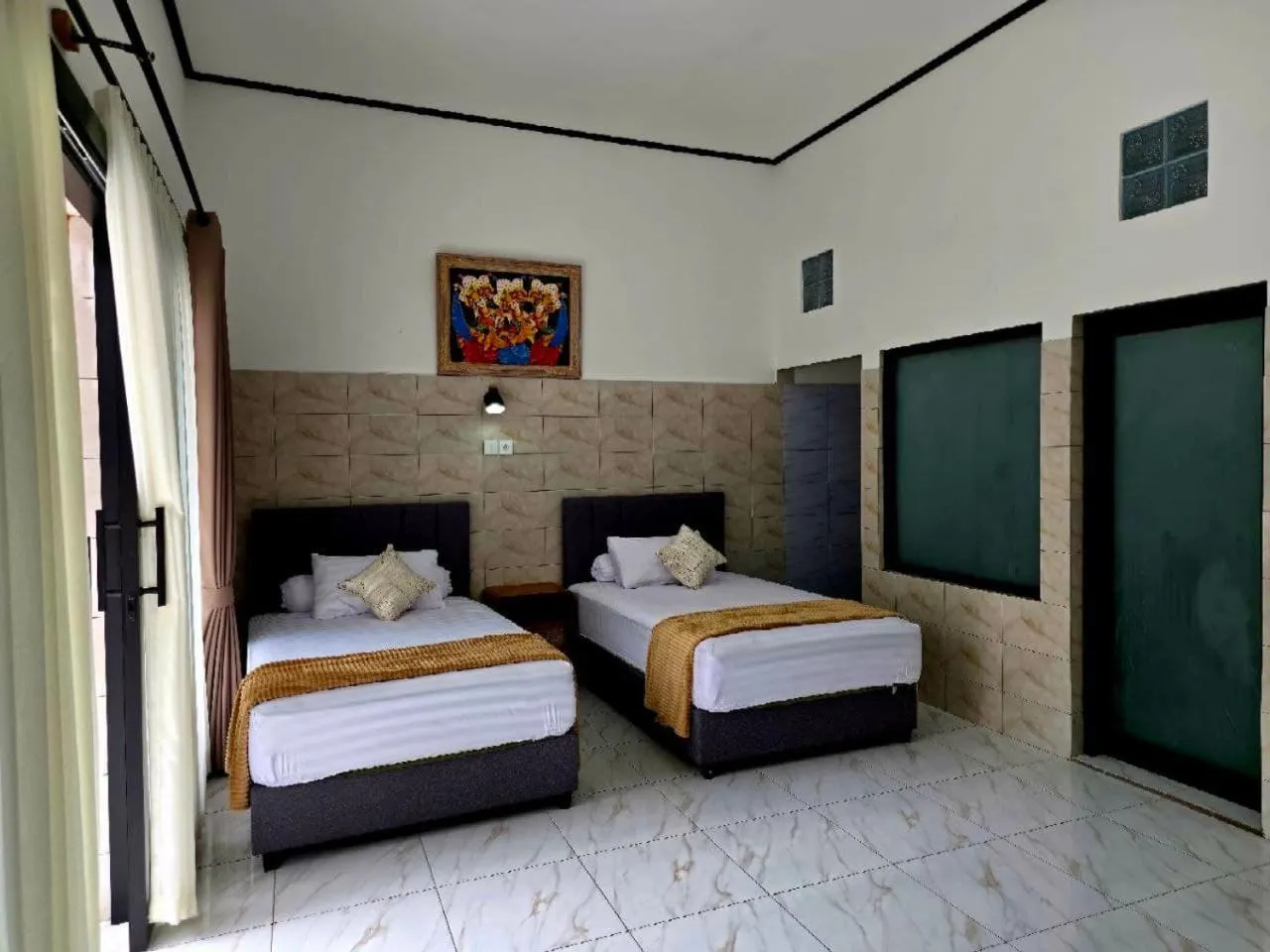 Bed in Kerti Beach Bungalow and Restaurant