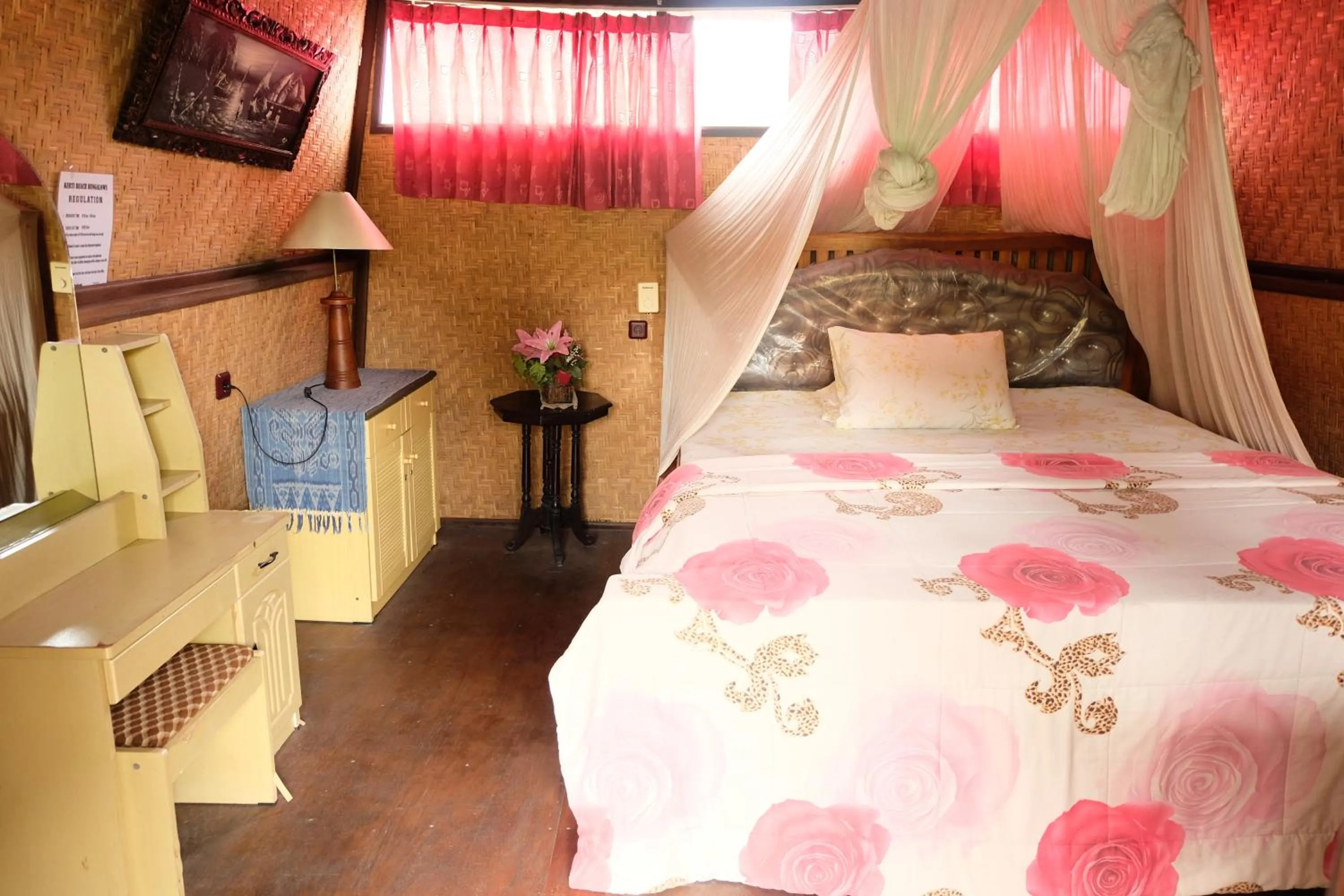 Bed in Kerti Beach Bungalow and Restaurant