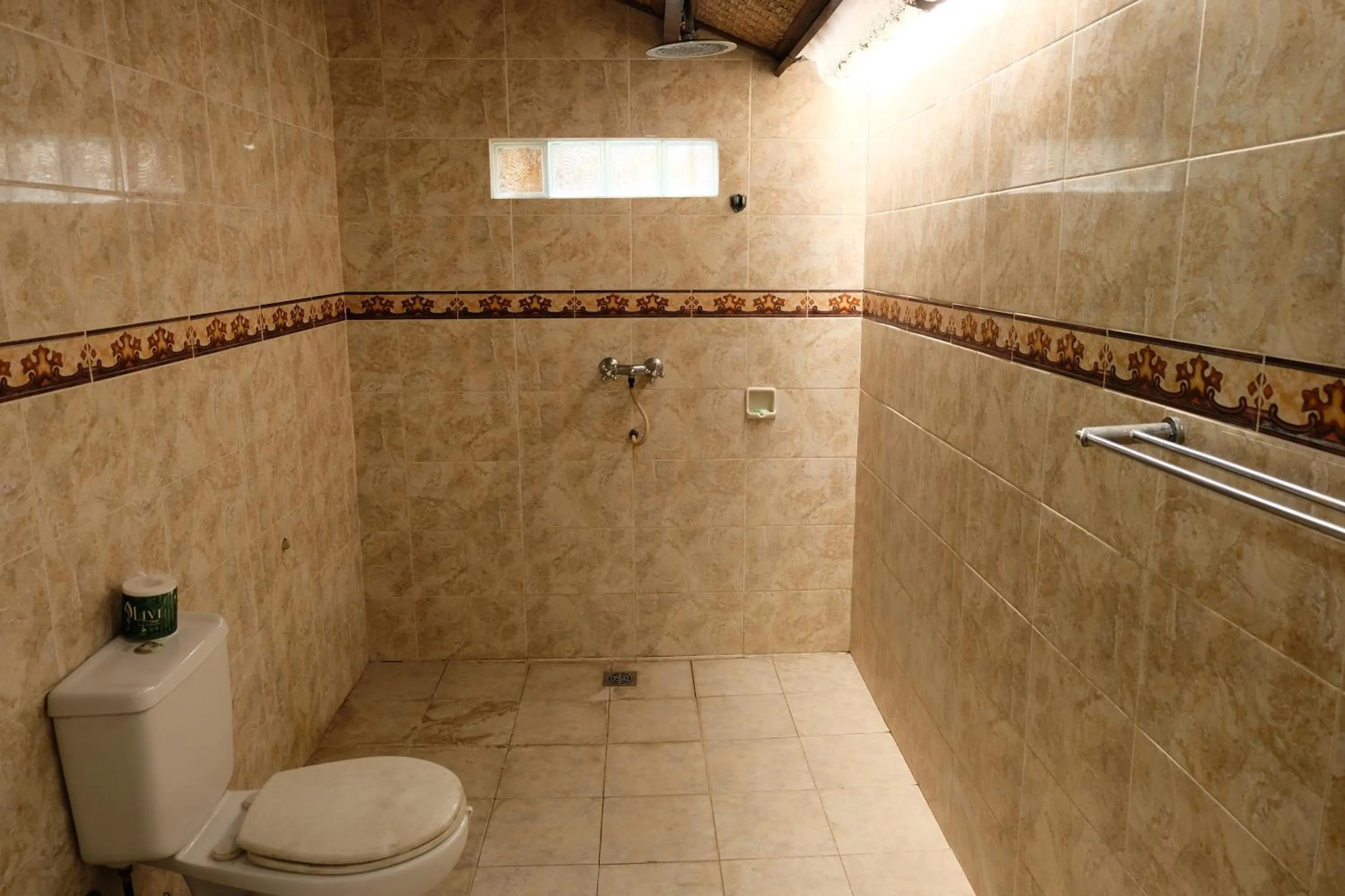 Bathroom in Kerti Beach Bungalow and Restaurant
