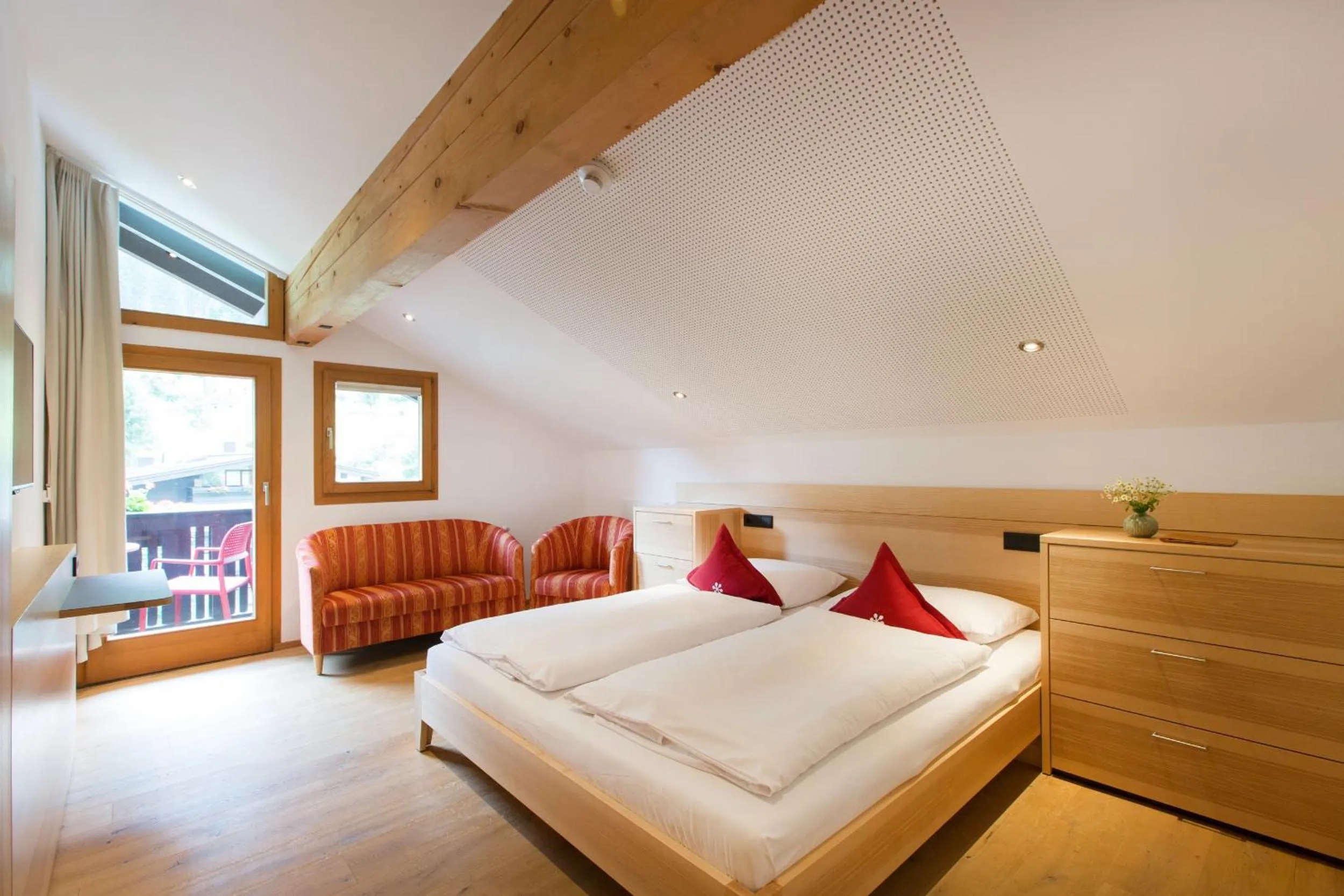 Living room, Bed in Familienhotel Mateera Gargellen / Montafon