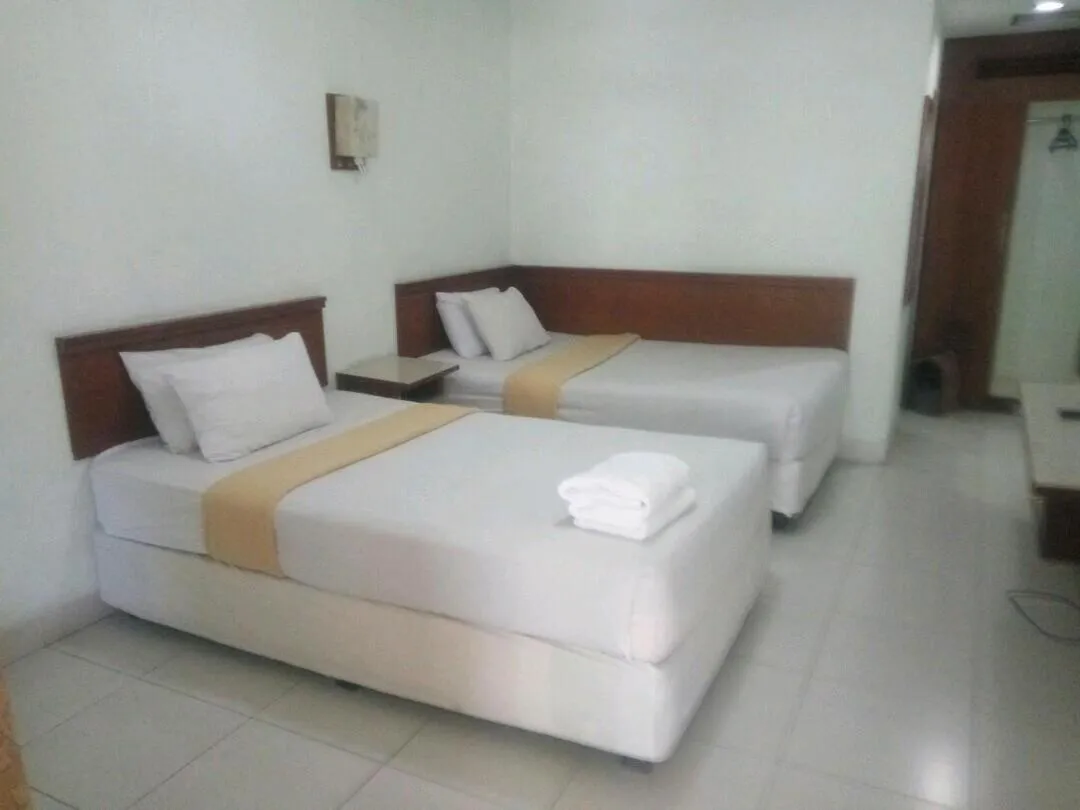 Bed in Pandu Lakeside Hotel Parapat
