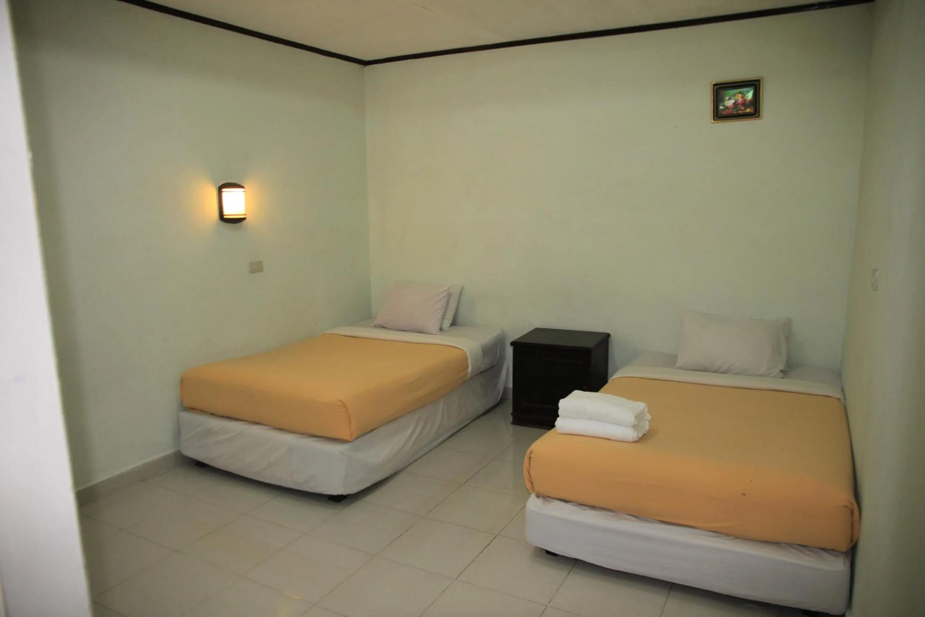 Bed in Pandu Lakeside Hotel Parapat