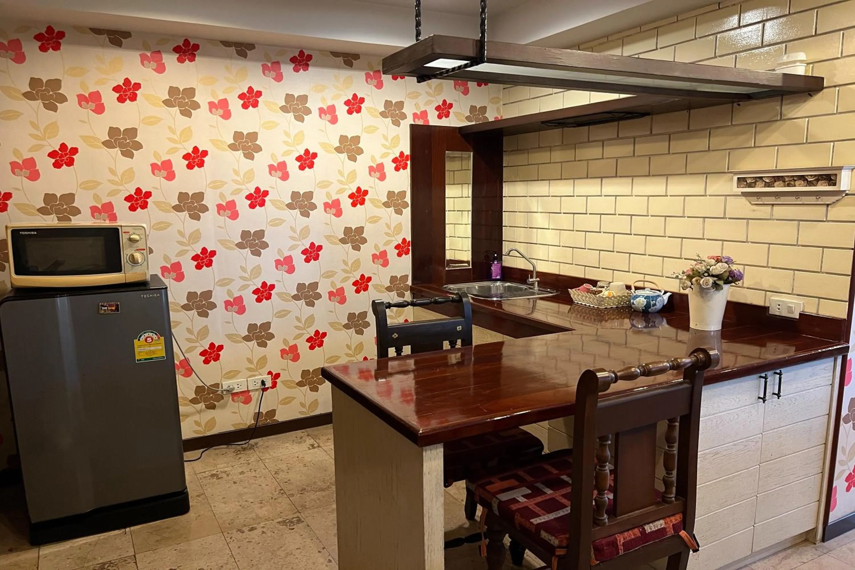 Kitchen or kitchenette in Sabai Sabai@Sukhumvit Hotel