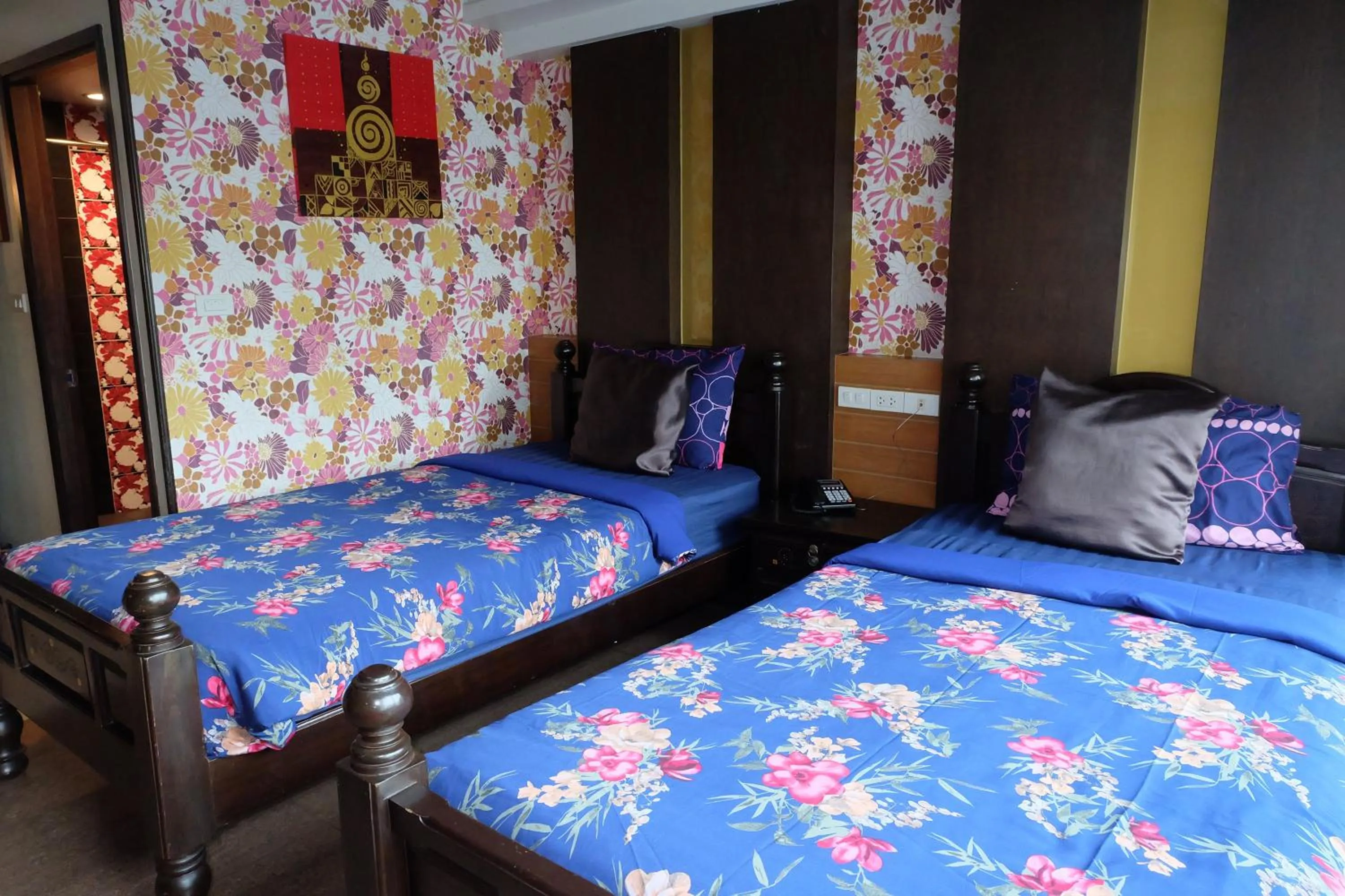 Bed in Sabai Sabai@Sukhumvit Hotel