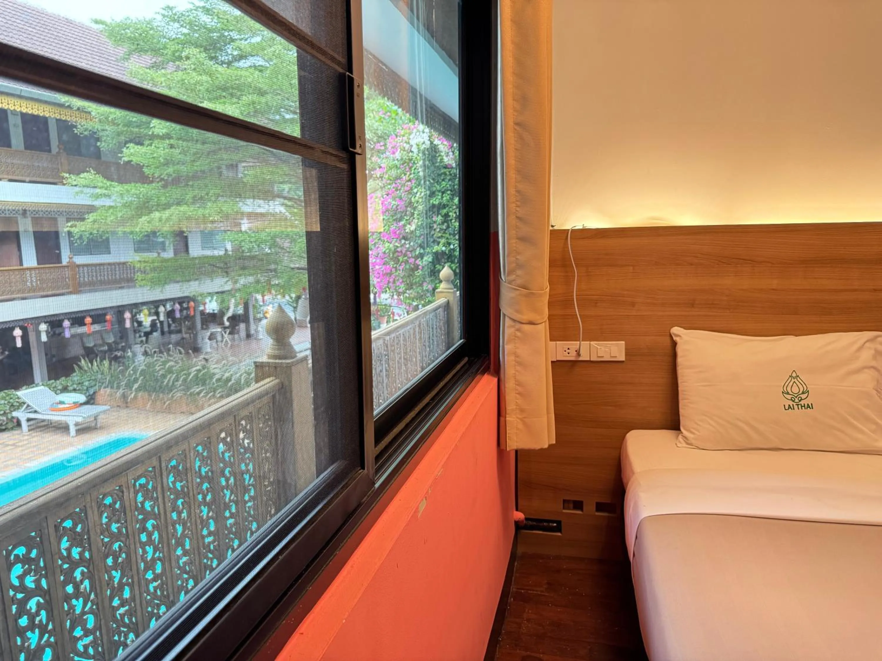 Bed in Lai Thai Guest House