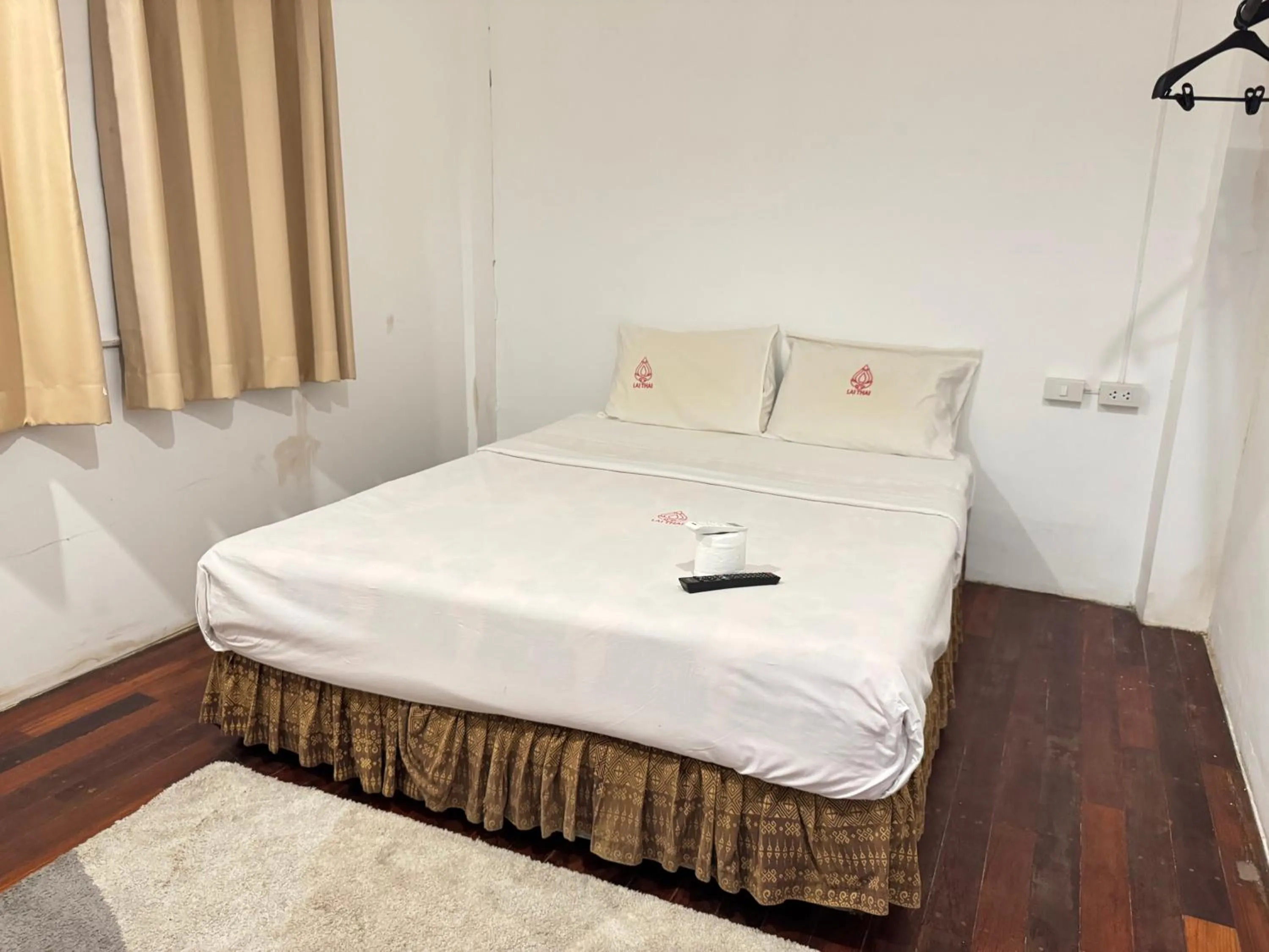 Bed in Lai Thai Guest House