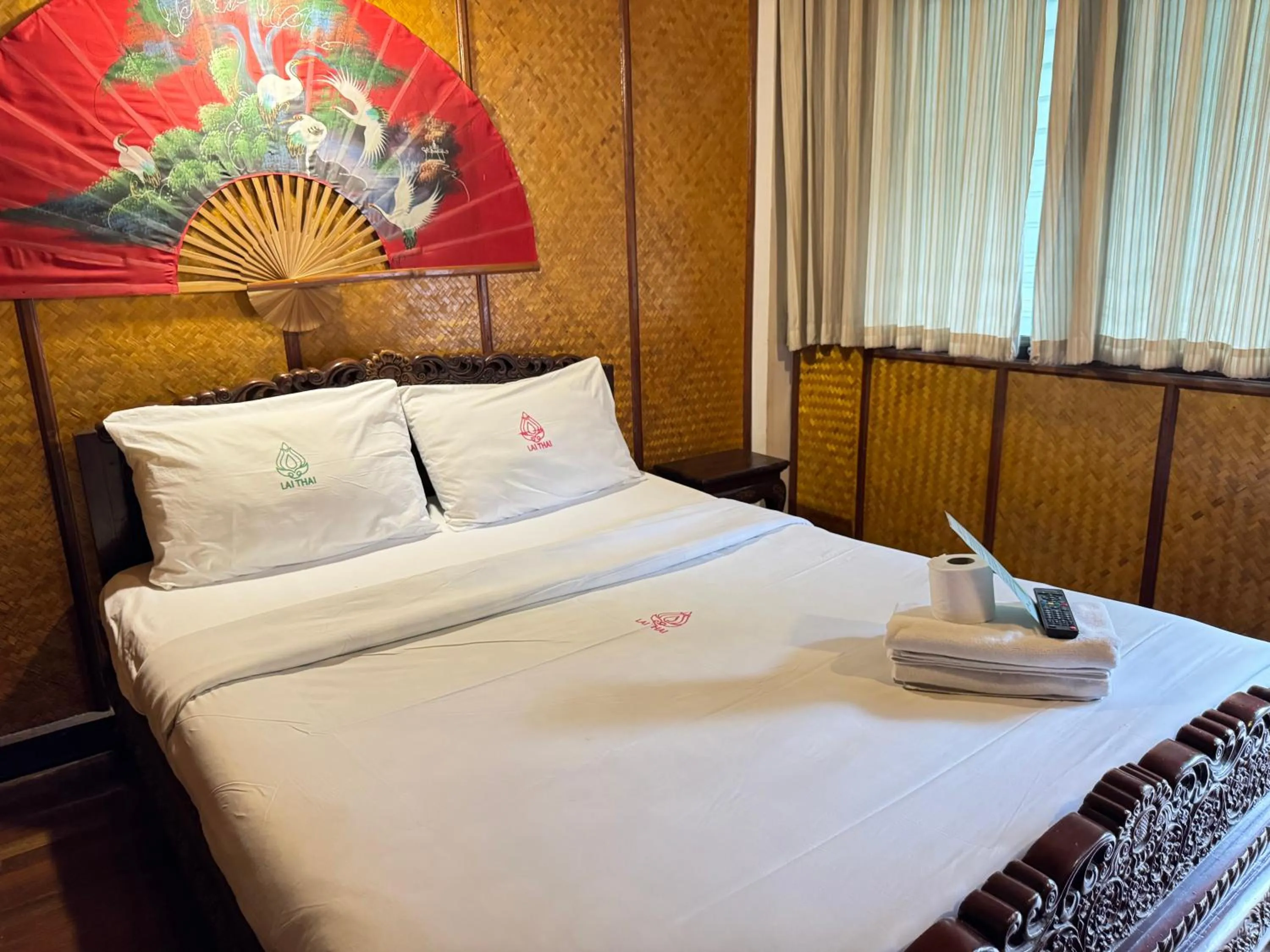 Bed in Lai Thai Guest House