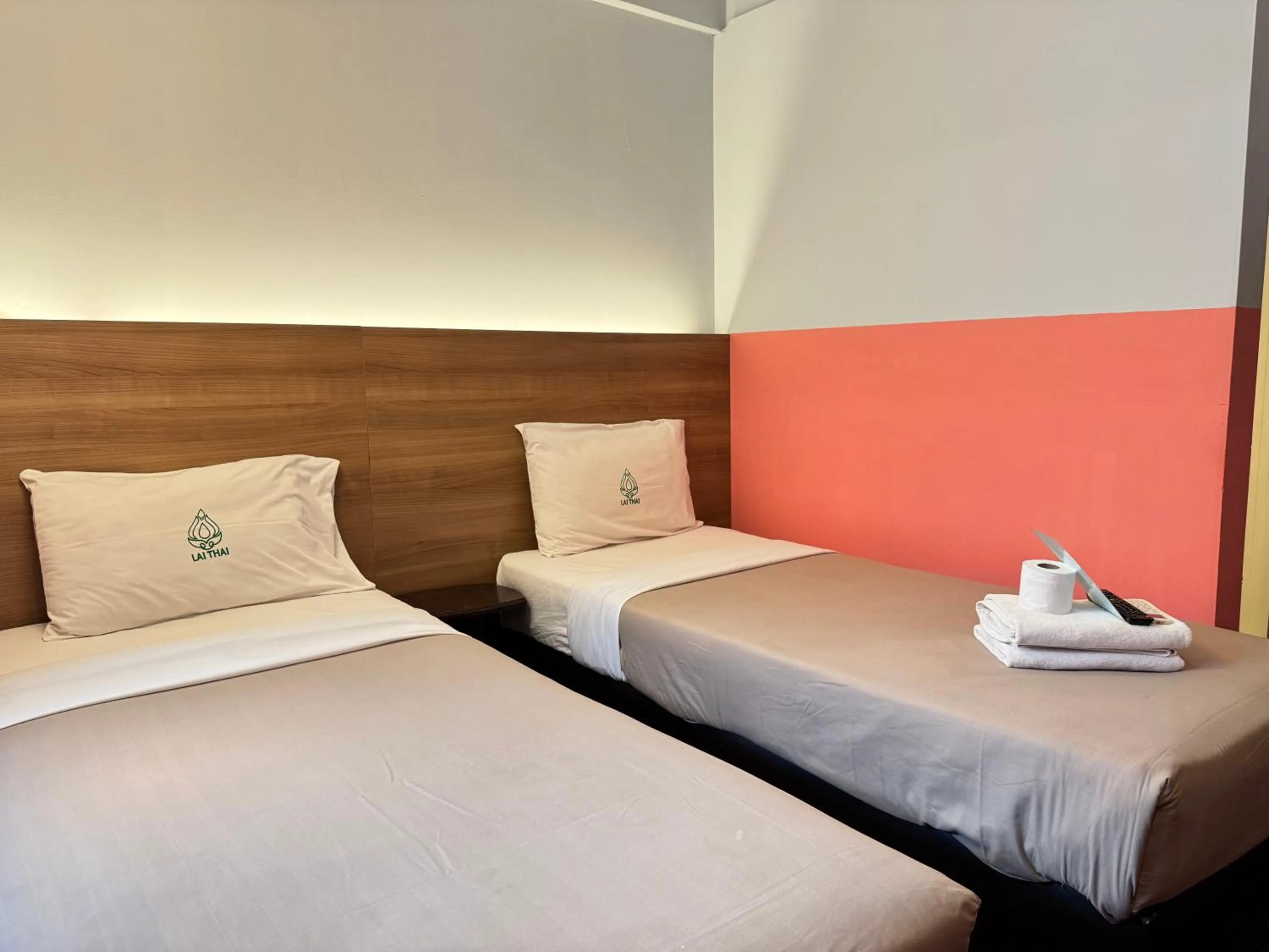 Bed in Lai Thai Guest House