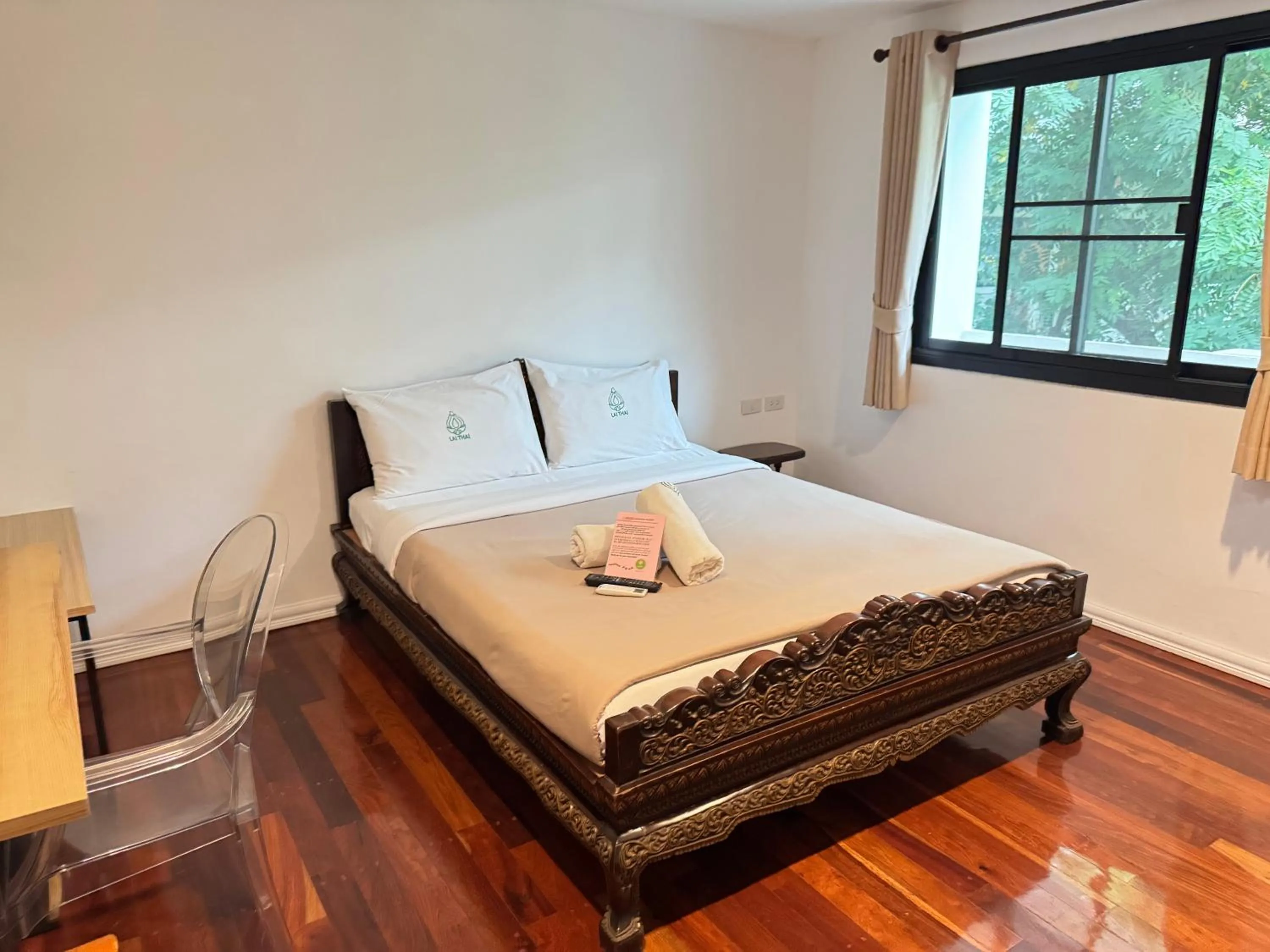 Bed in Lai Thai Guest House