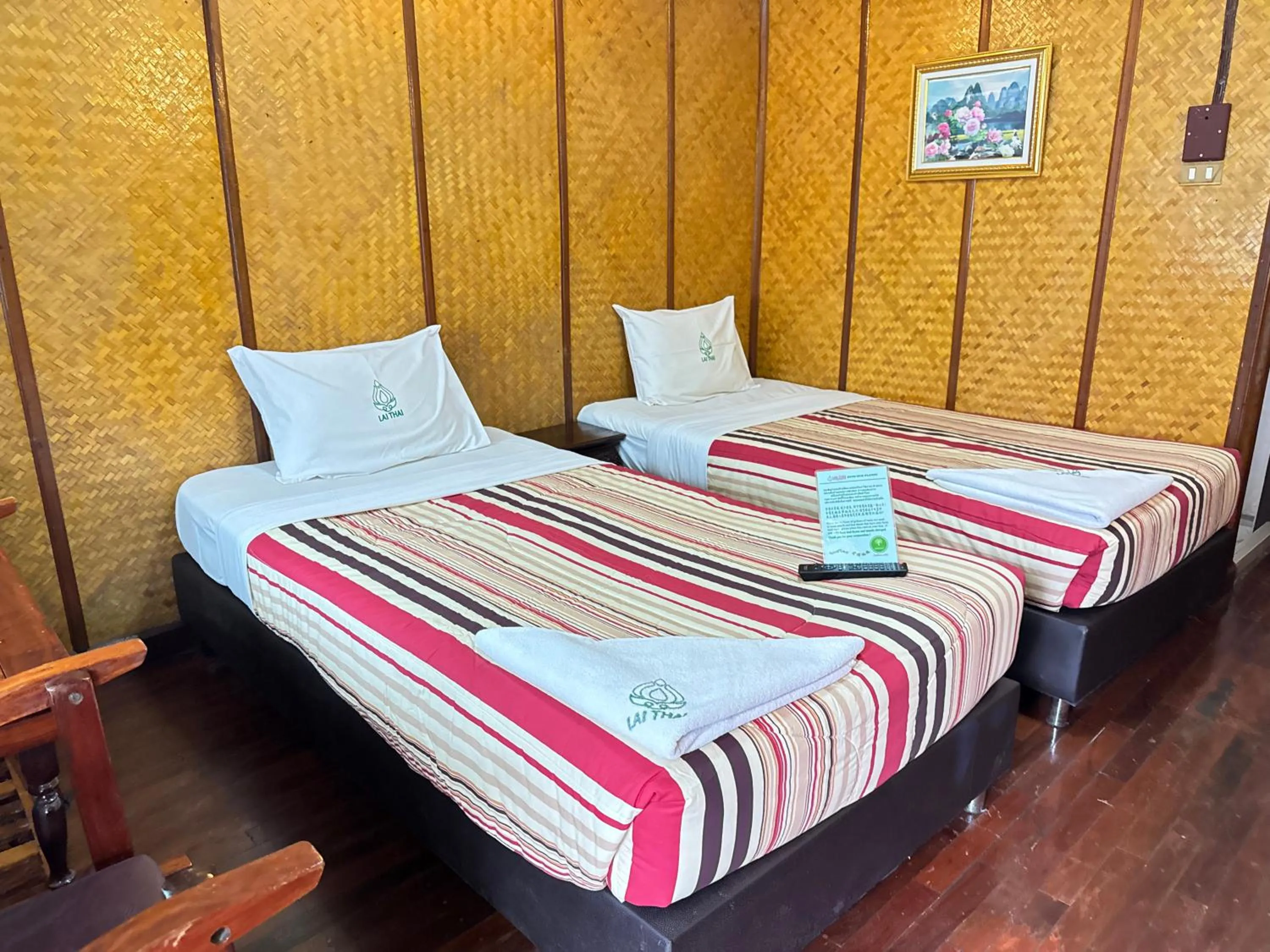 Bed in Lai Thai Guest House