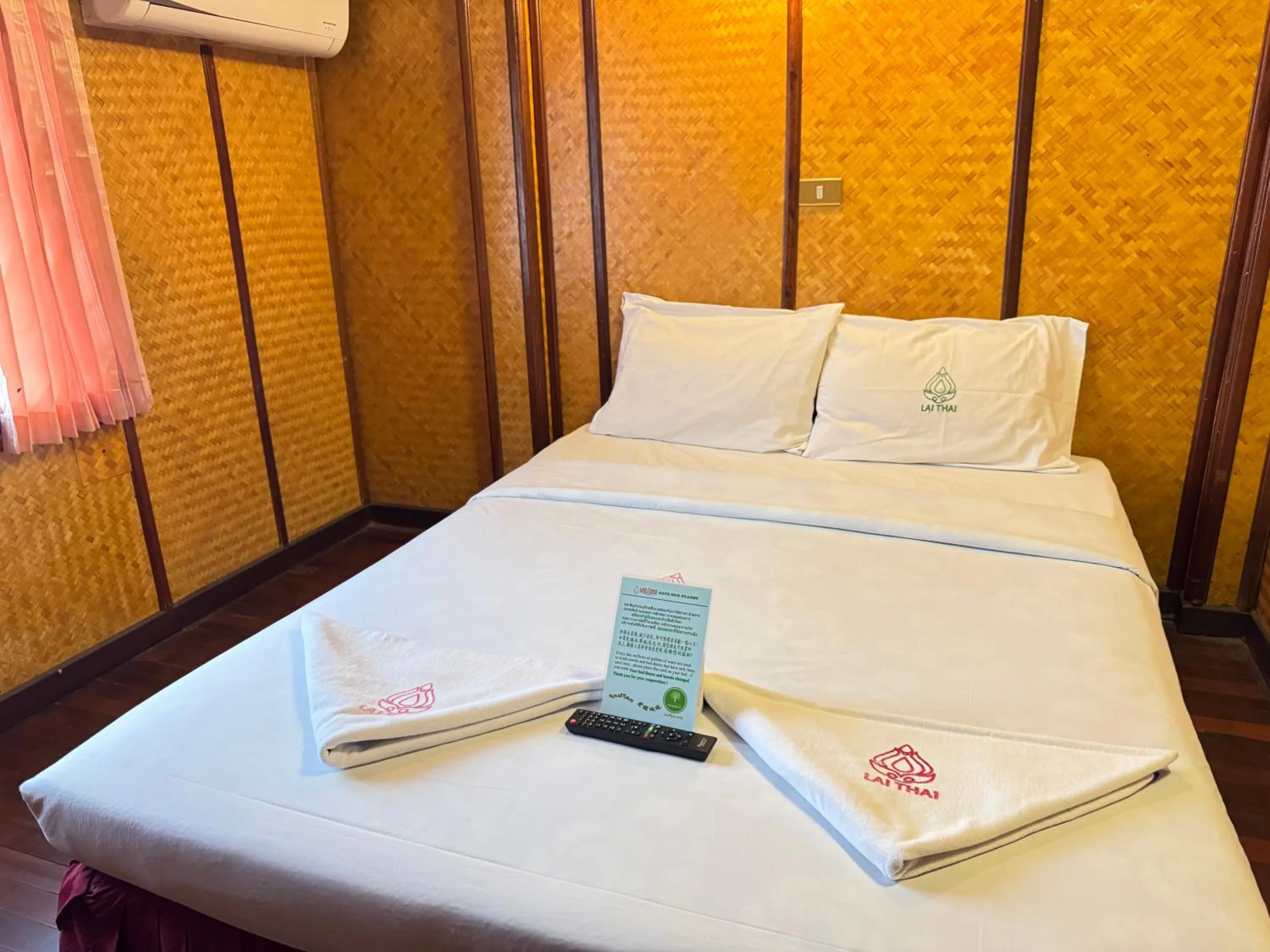 Bed in Lai Thai Guest House