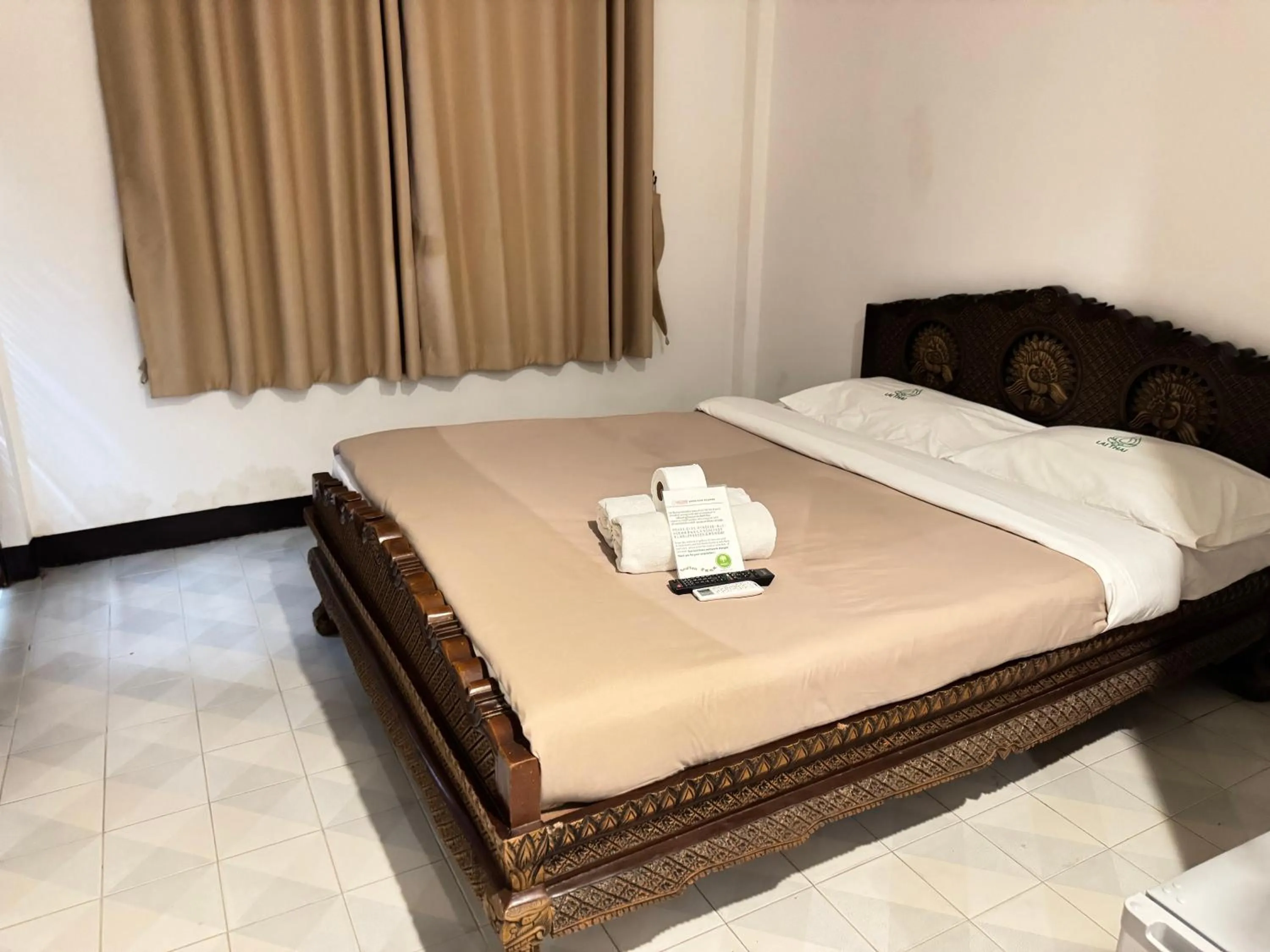 Bed in Lai Thai Guest House