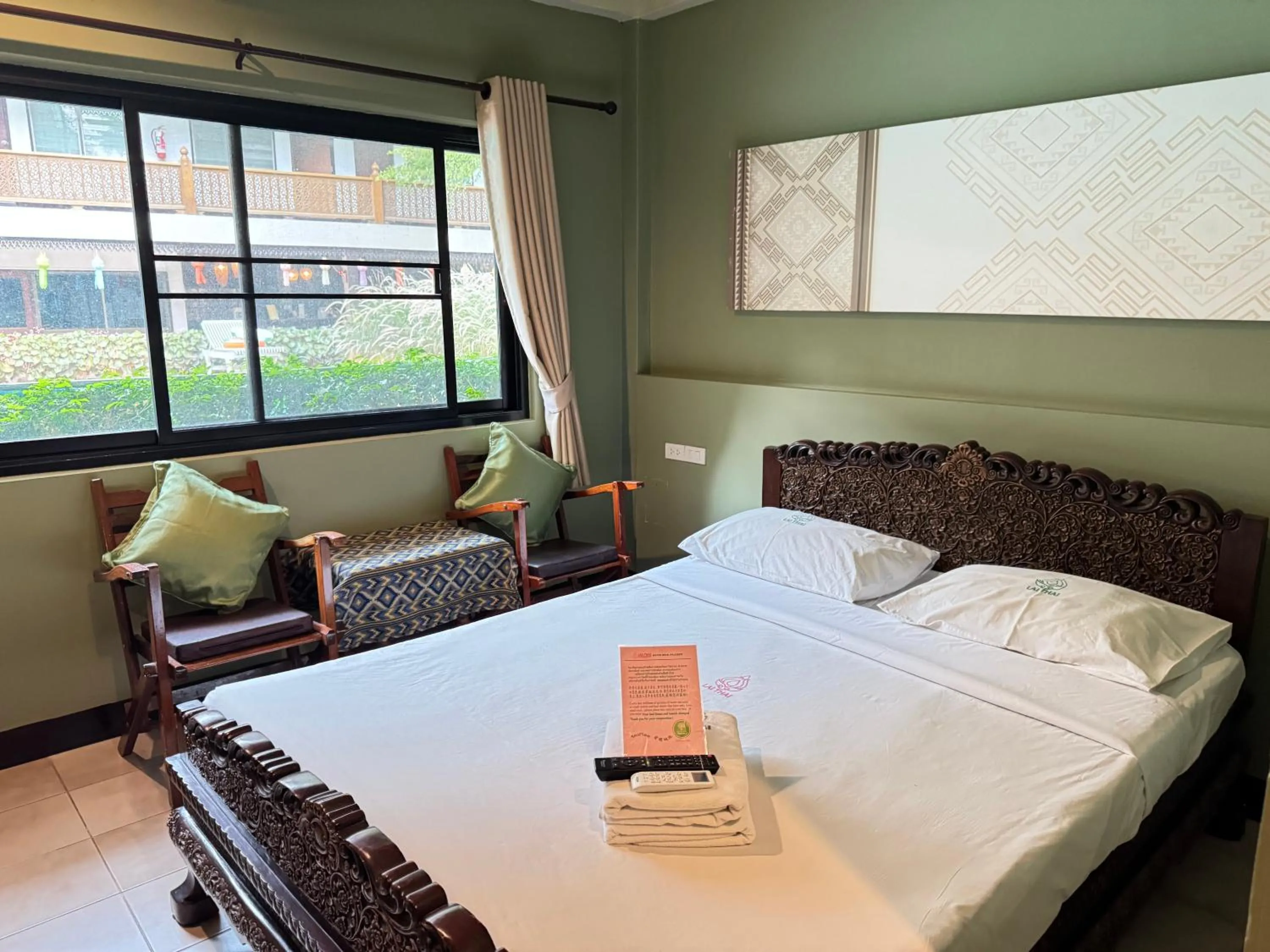 Bed in Lai Thai Guest House