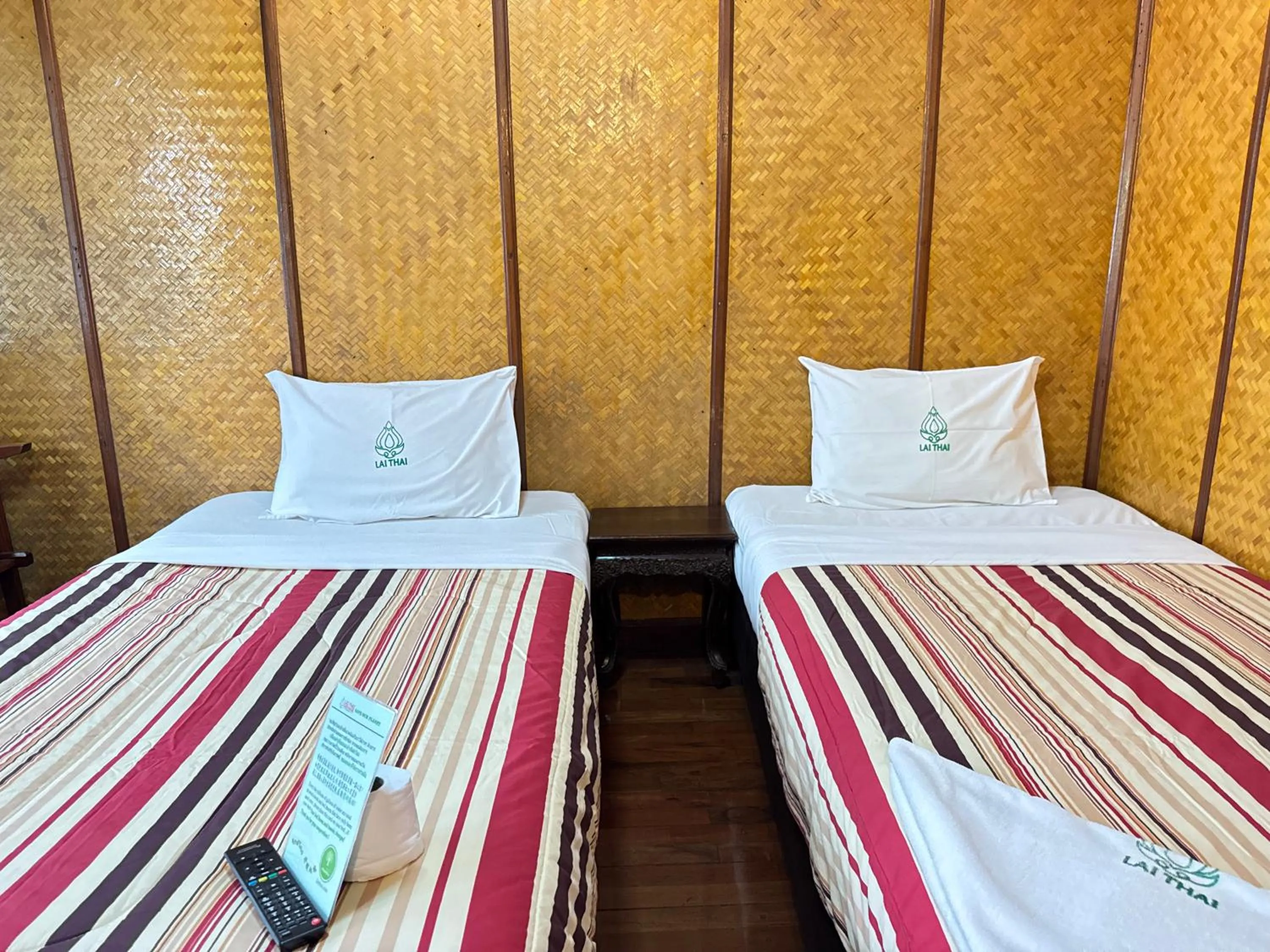 Bed in Lai Thai Guest House