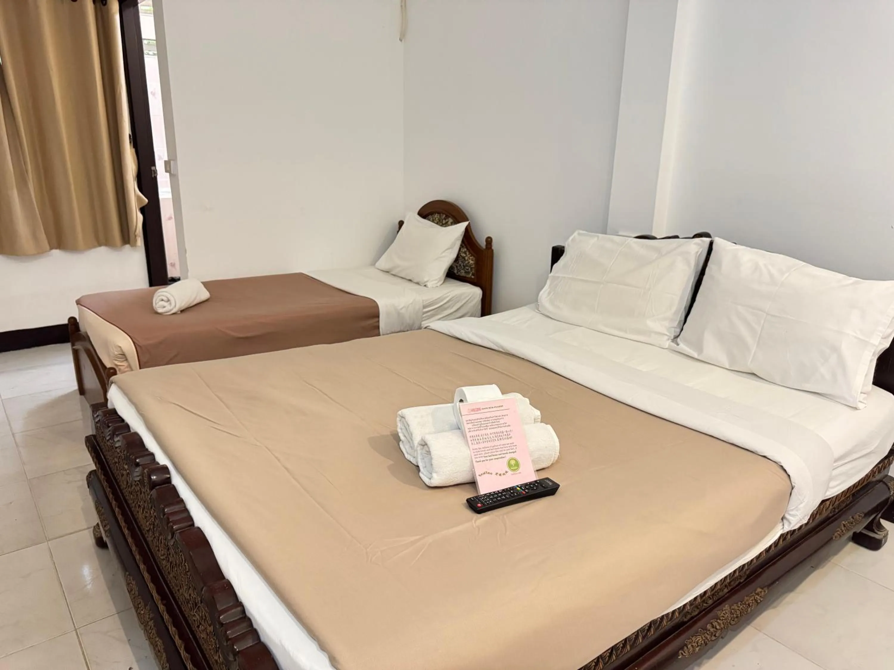 Bed in Lai Thai Guest House