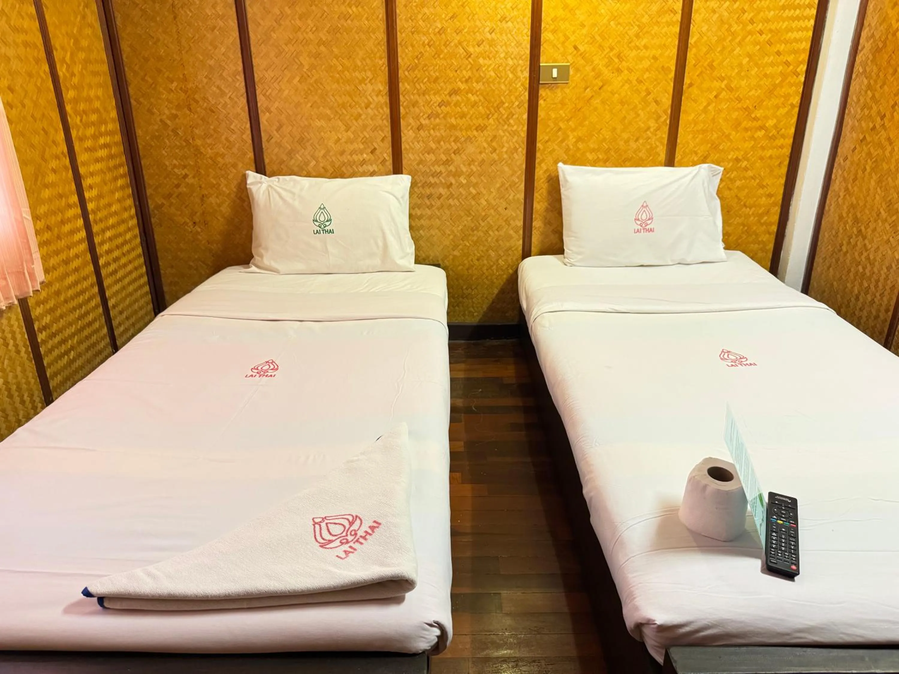 Bed in Lai Thai Guest House