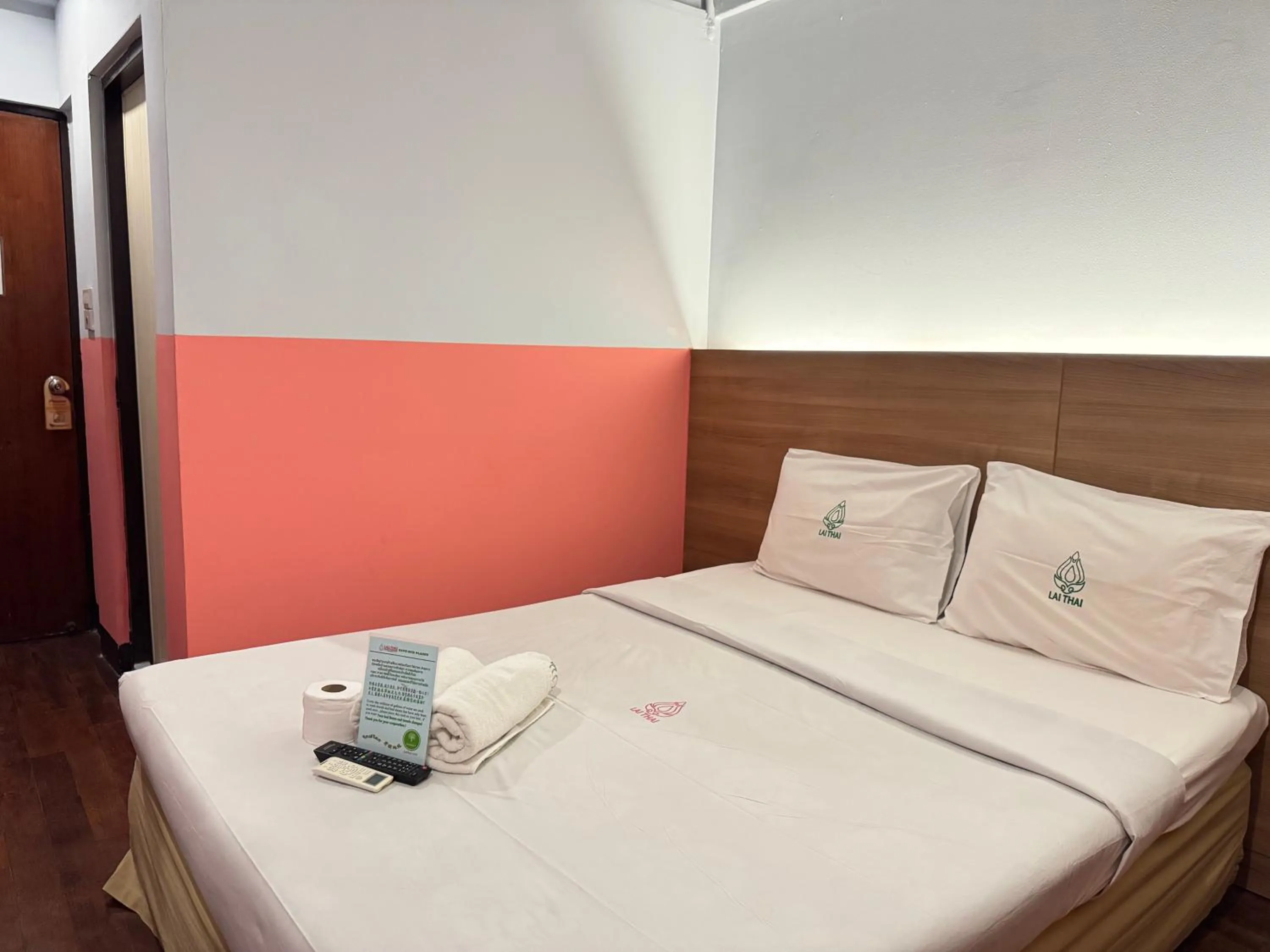 Bed in Lai Thai Guest House