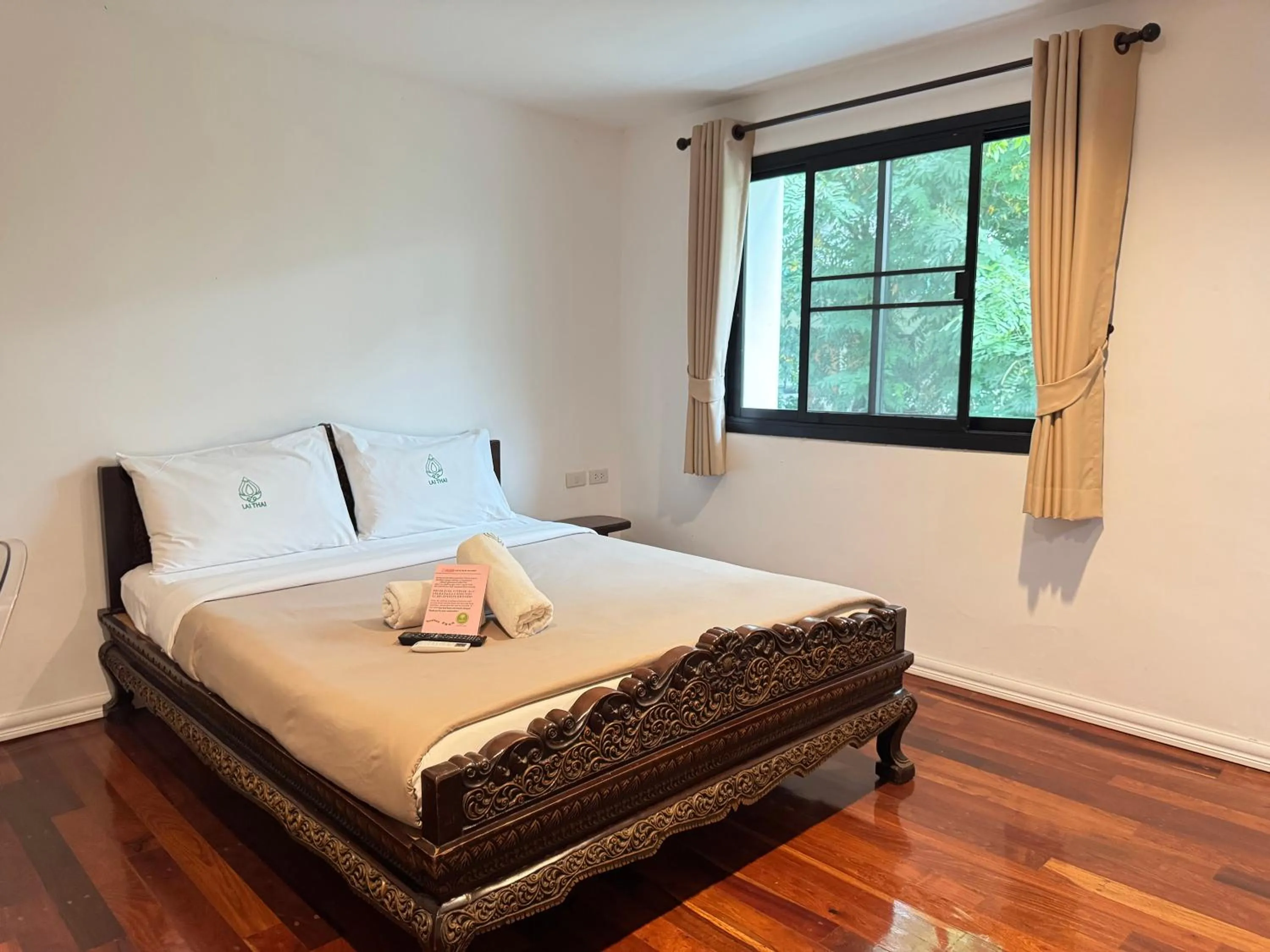 Bed in Lai Thai Guest House