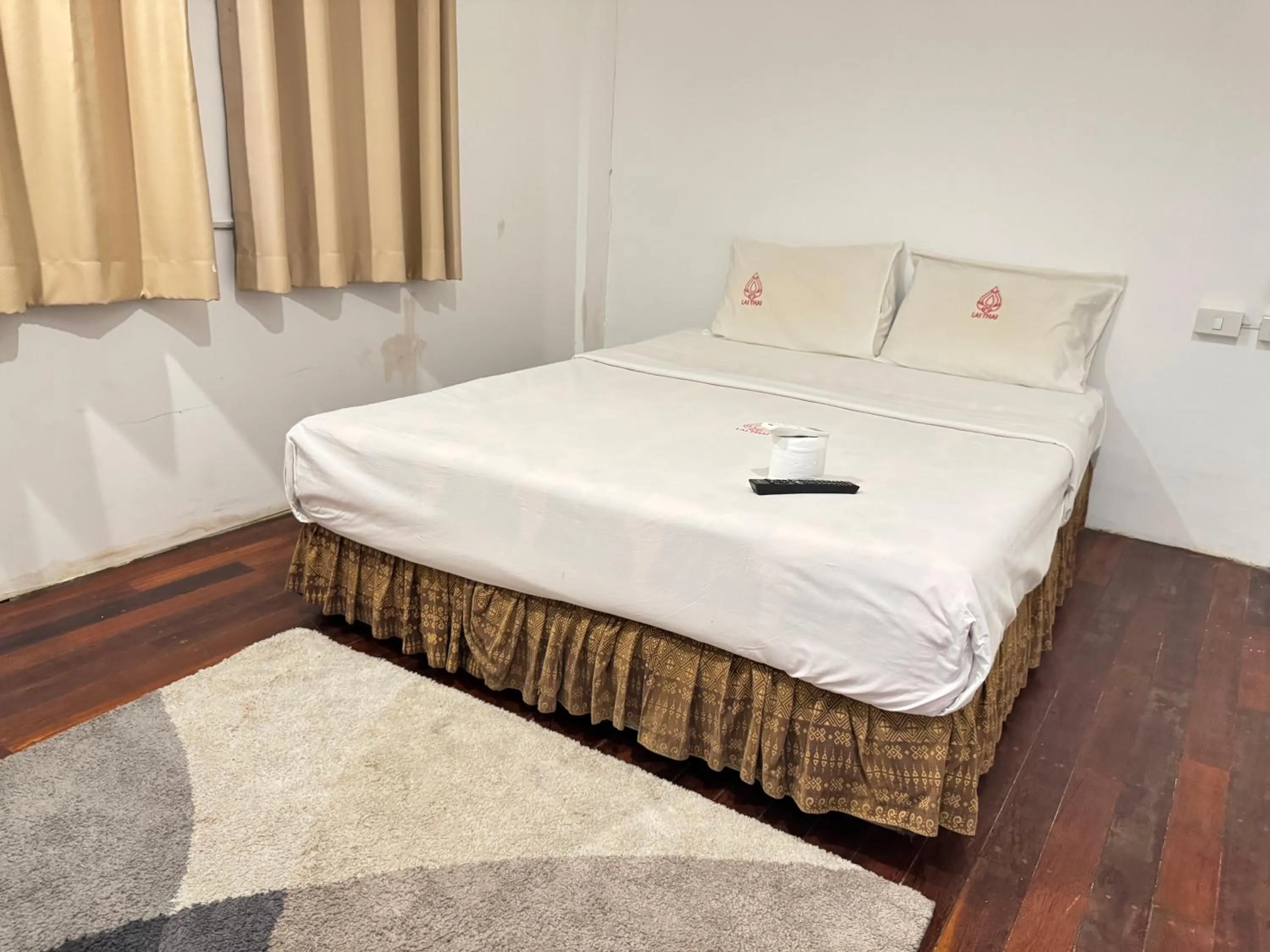 Bed in Lai Thai Guest House