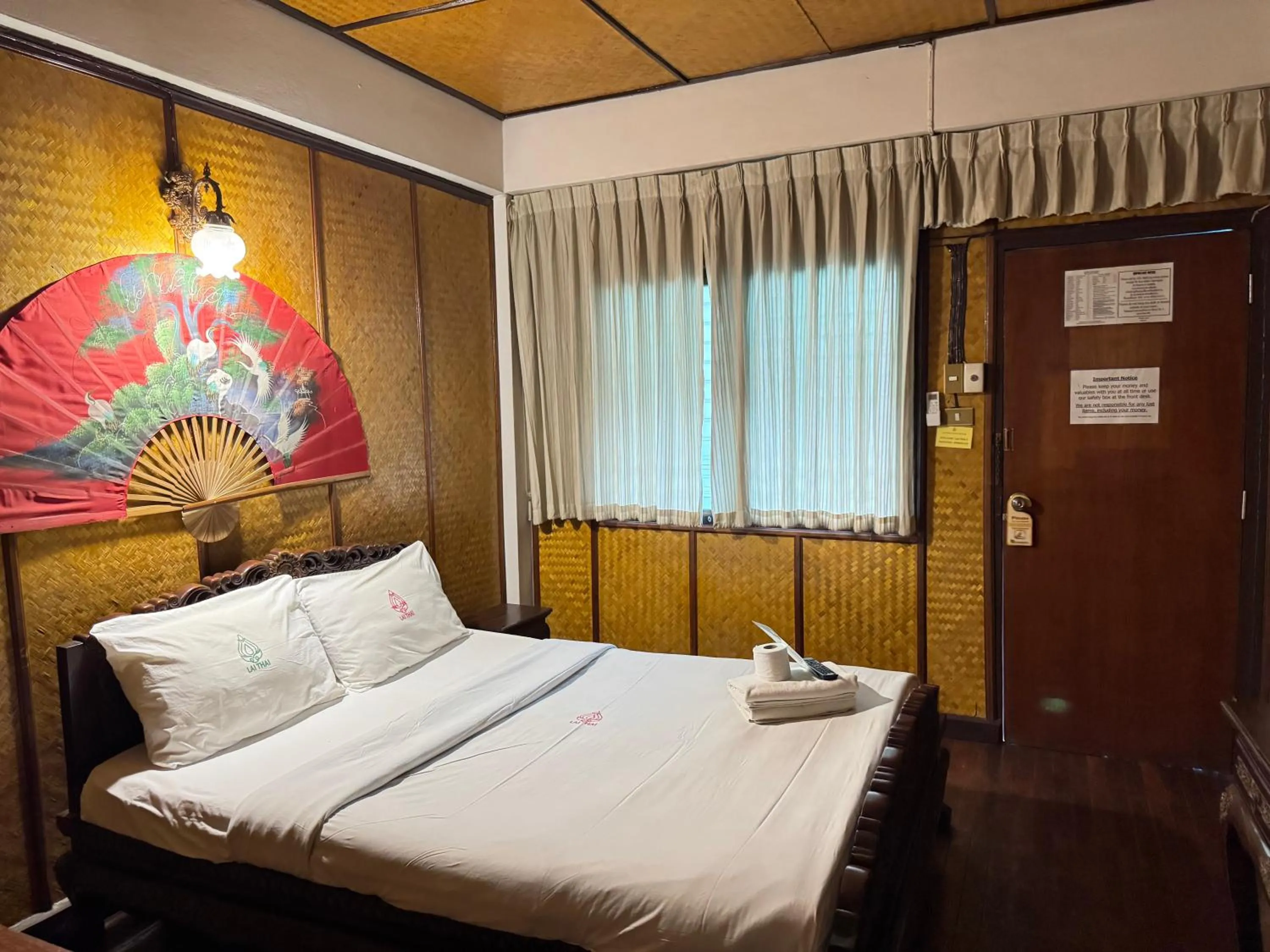 Bed in Lai Thai Guest House