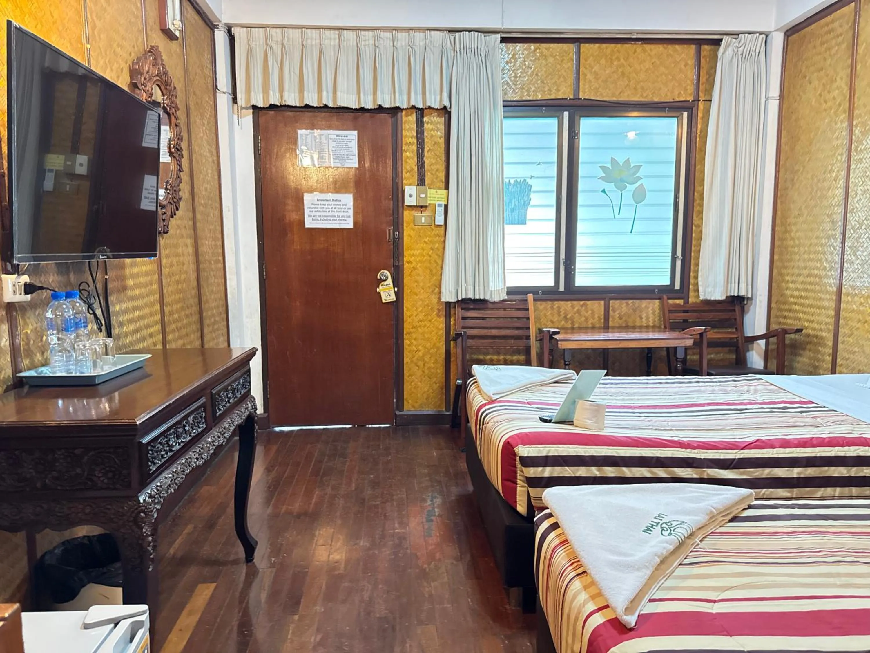 Bed in Lai Thai Guest House