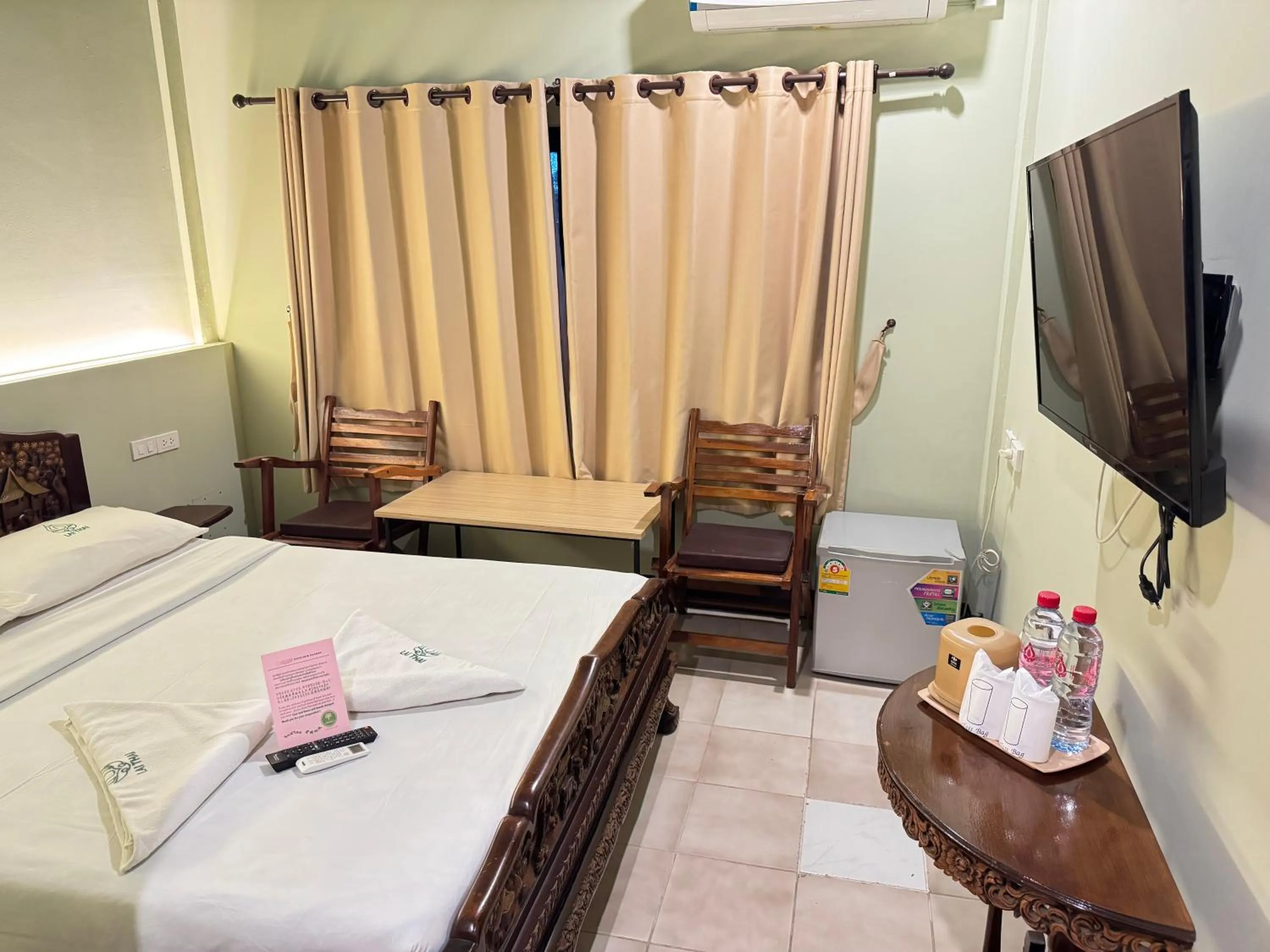 Bed in Lai Thai Guest House
