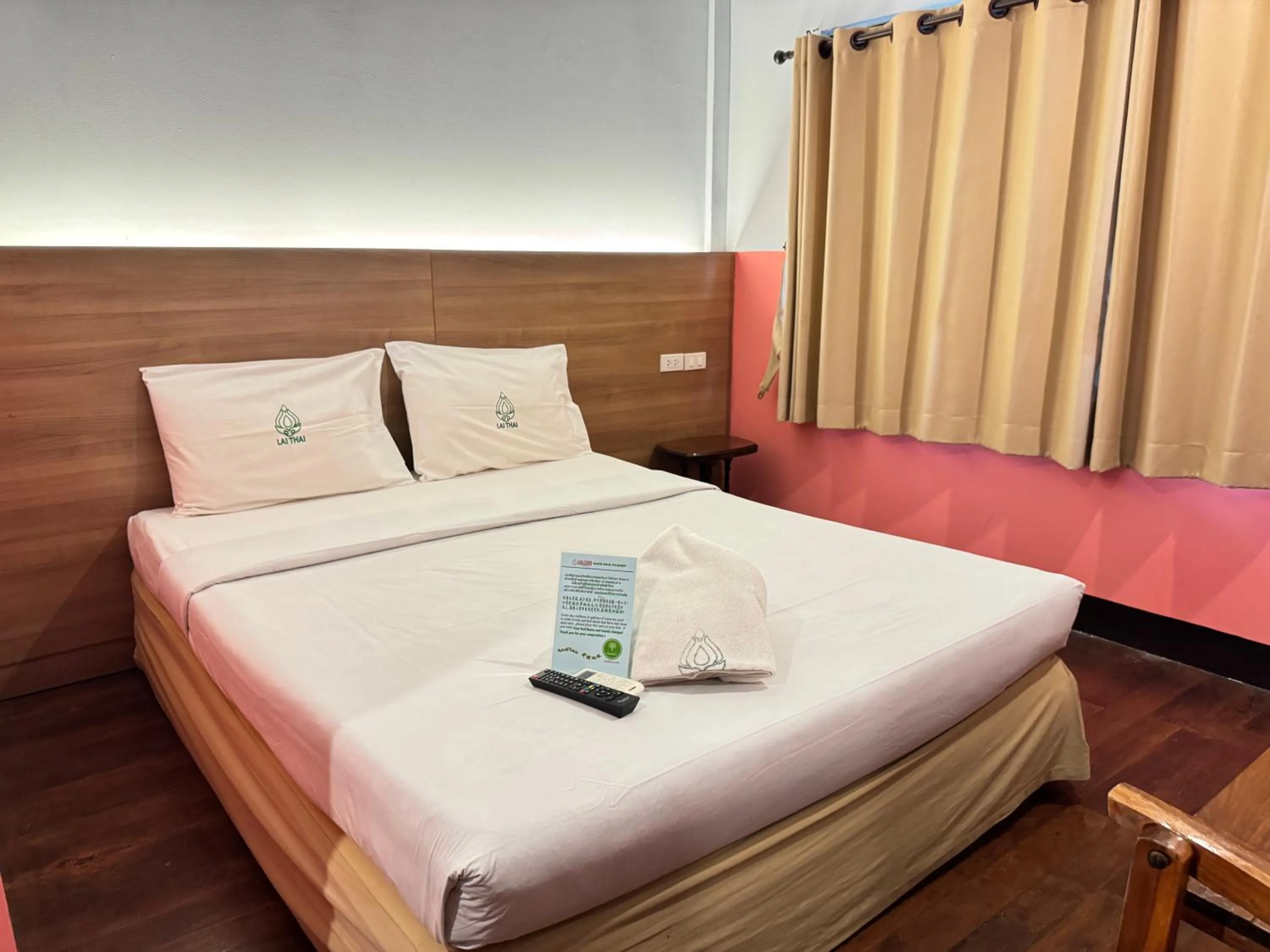 Bed in Lai Thai Guest House