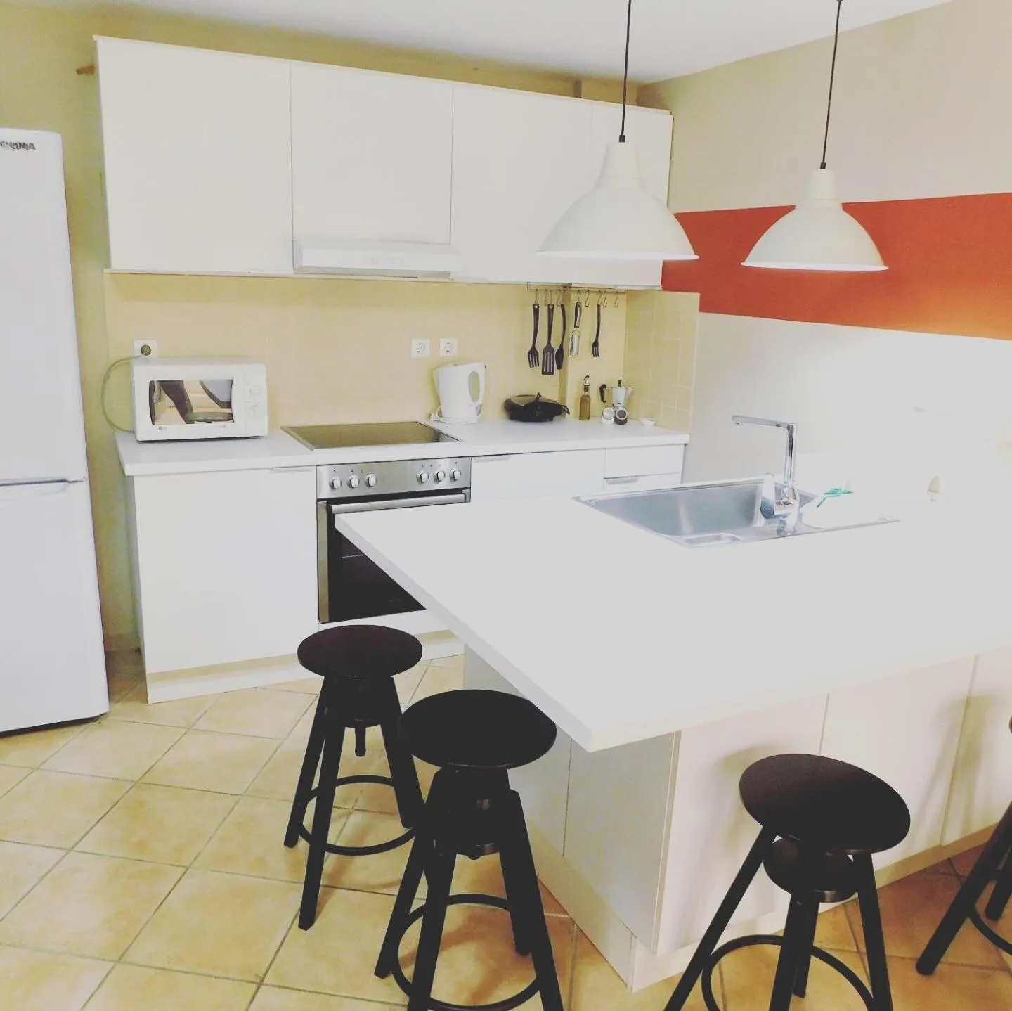 Kitchen or kitchenette in Elizabeth Suites