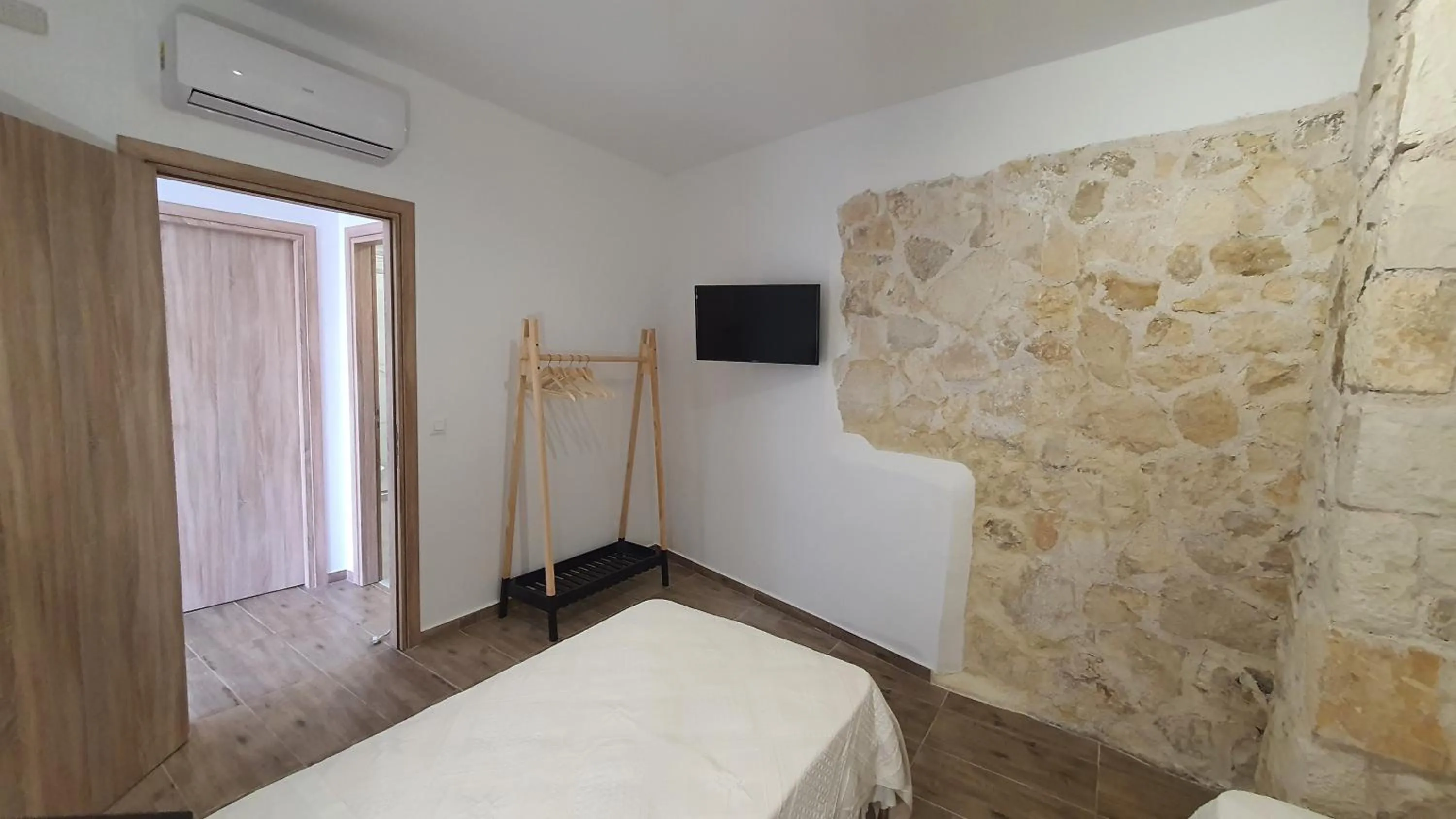 Bed in Elizabeth Suites