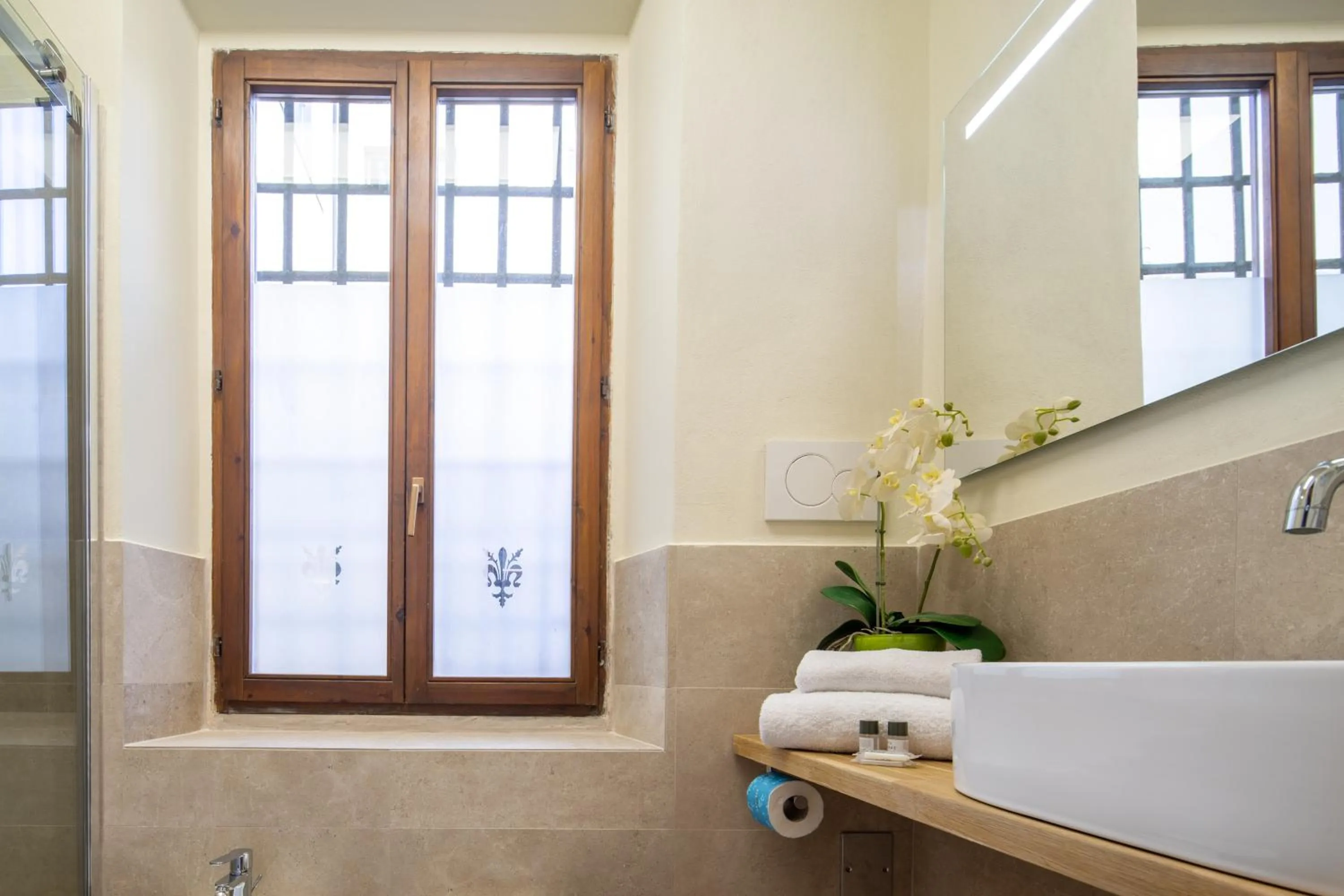 Bathroom in Duomo Apartments by Mmega