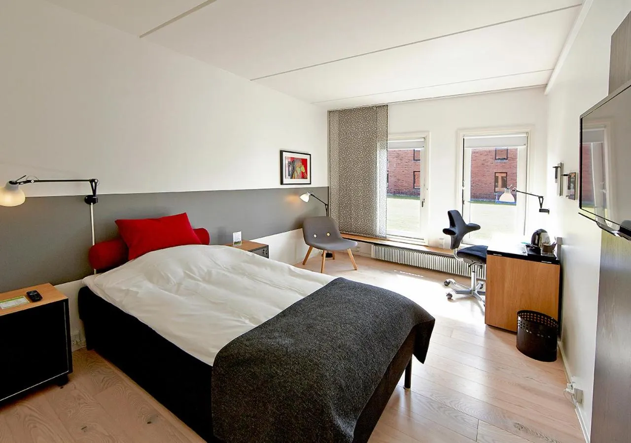 Bed in Pharmakon Hotel & Conferencecenter